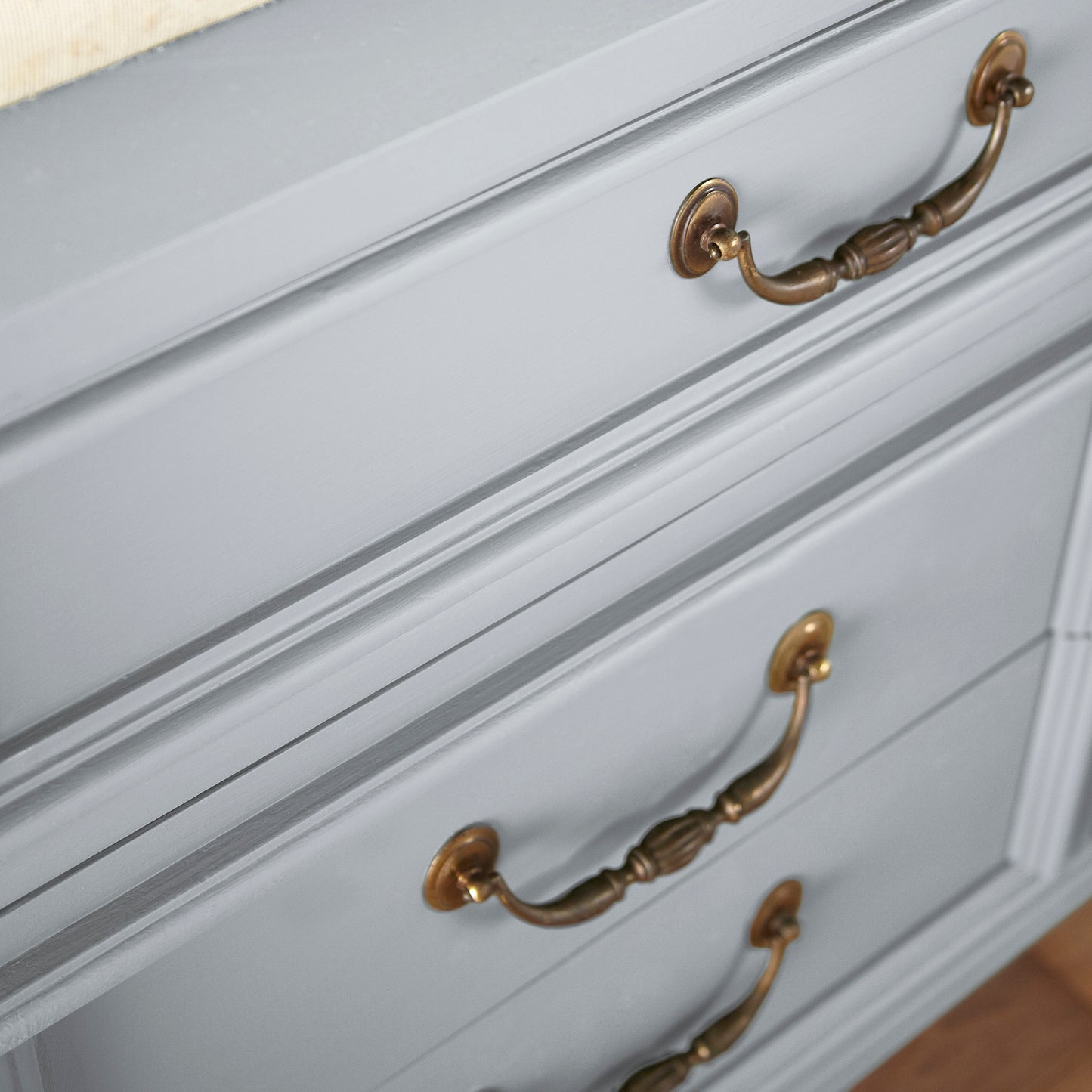 Soft cool gray door and cabinet paint named cement pots shown painted on cabinet