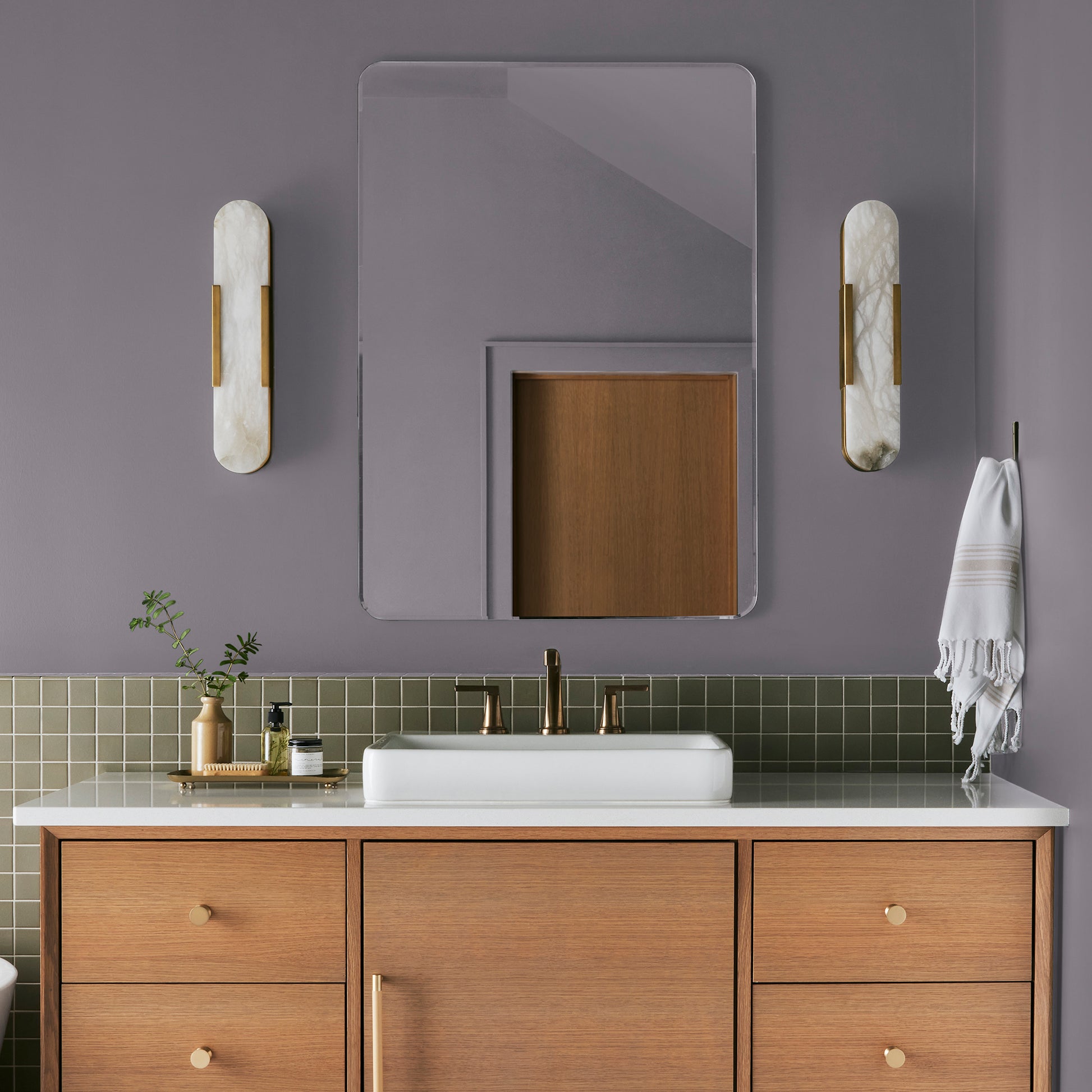 deep pastel purple paint named pashmina plum shown painted on bathroom wall