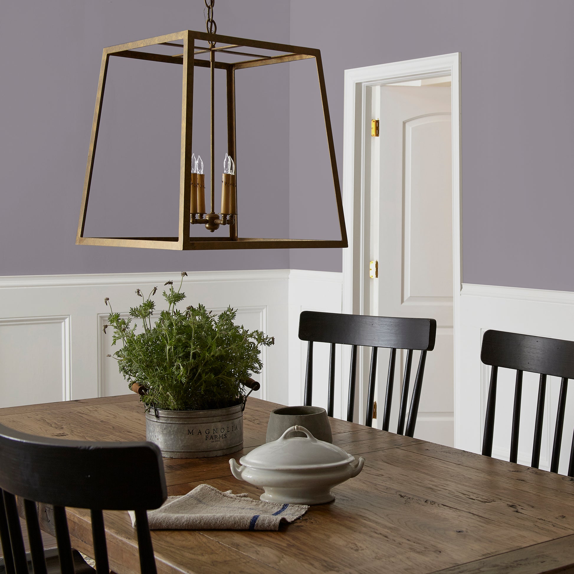 deep pastel purple paint named pashmina plum shown painted on dining room wall