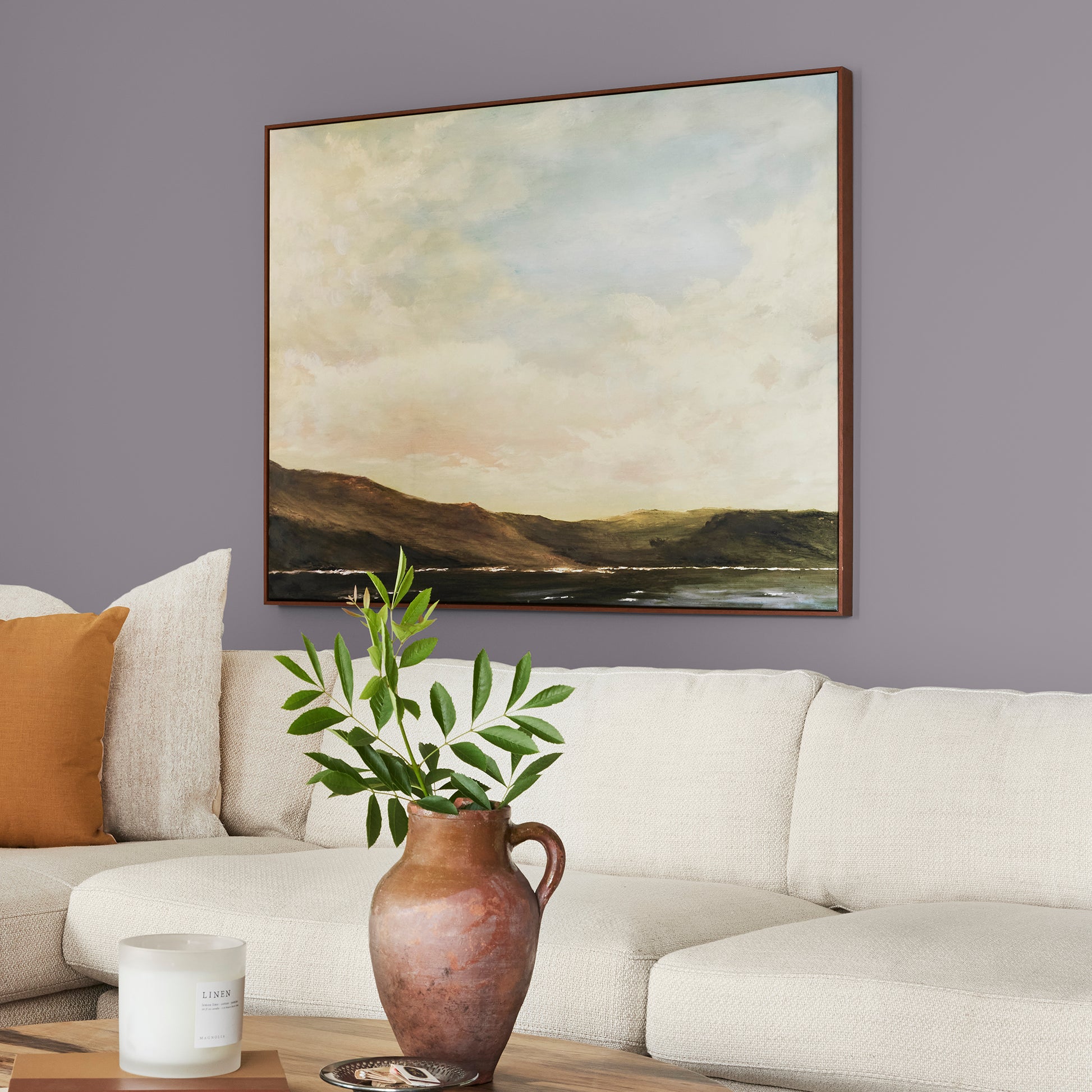 deep pastel purple paint named pashmina plum shown painted on living room wall