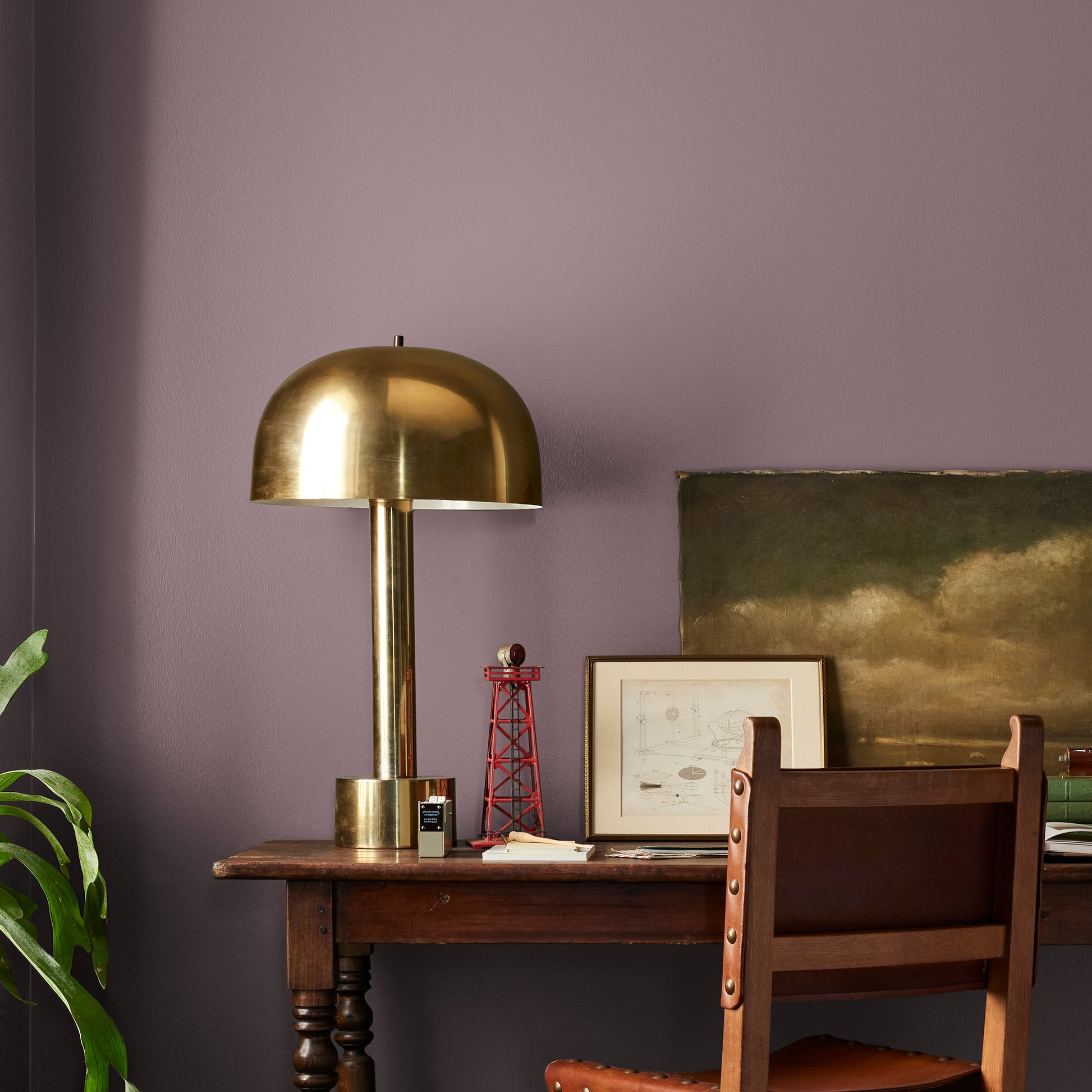 Deep and dusty berry interior paint named webster avenue shown painted on bedroom wall