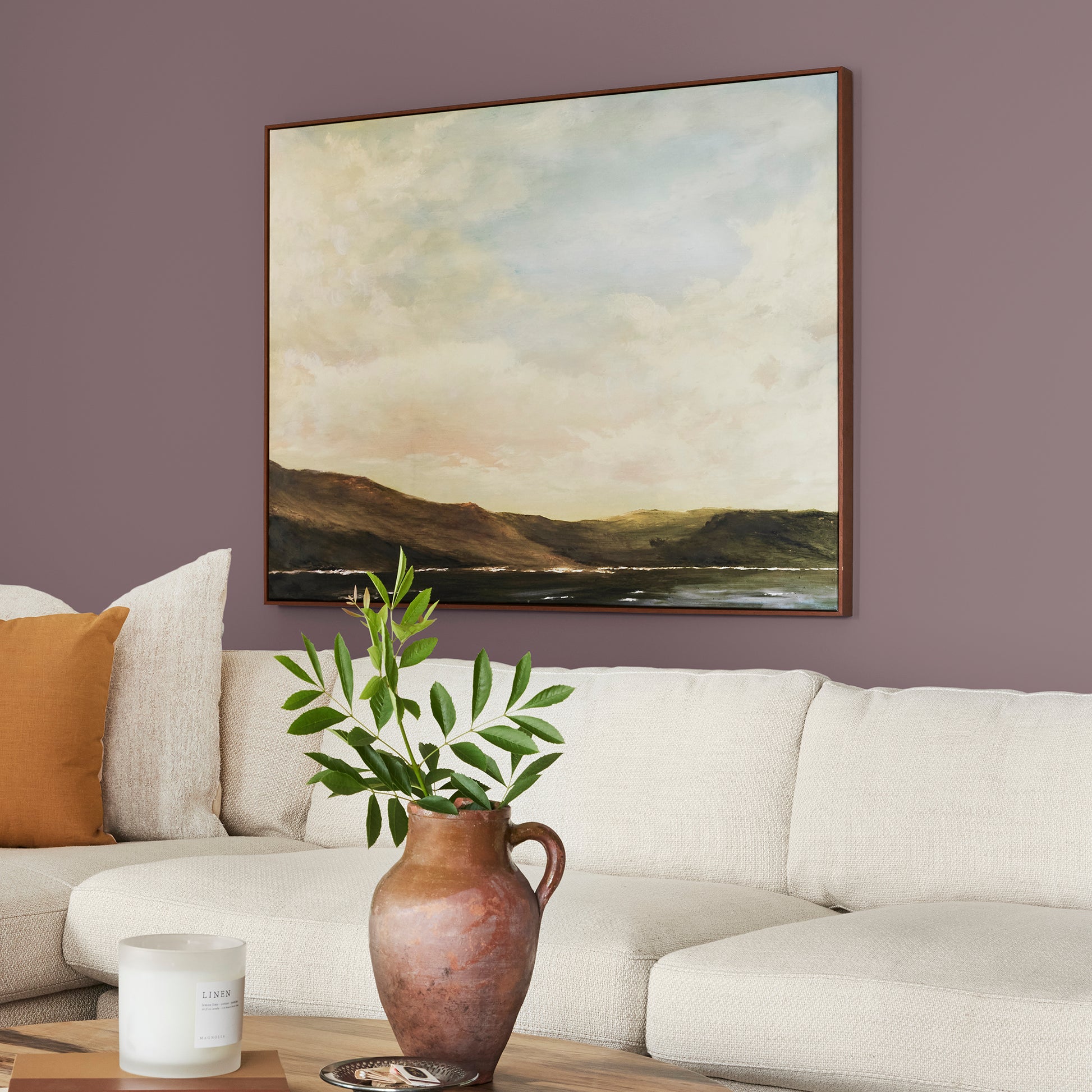 Deep and dusty berry interior paint named webster avenue shown painted on living room wall