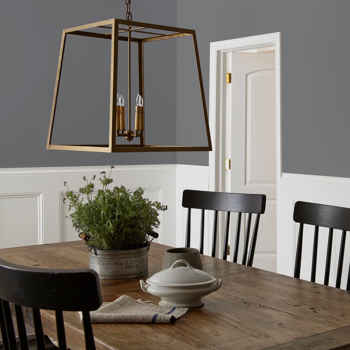 dark charcoal gray paint named autumn gray shown painted on dining room wall