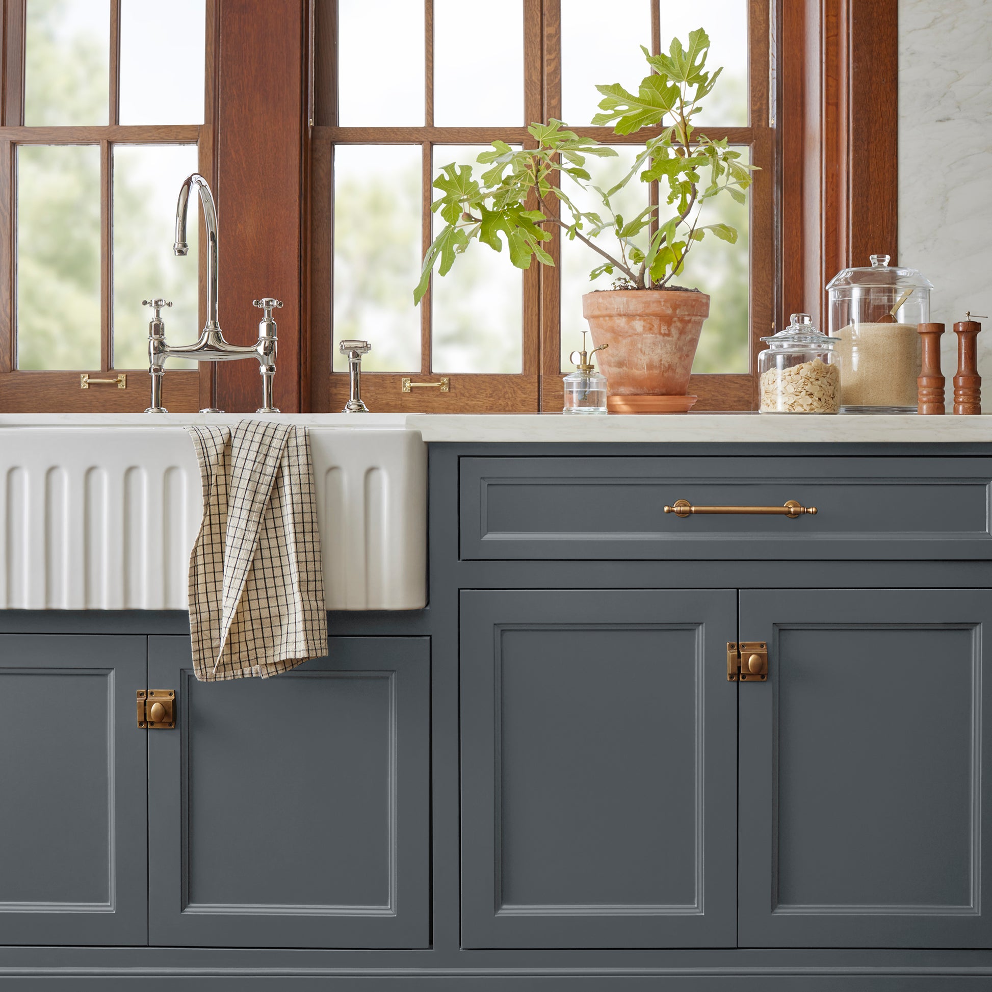 Almost black with blue undertones door and cabinet paint named fine black shown painted on kitchen cabinet