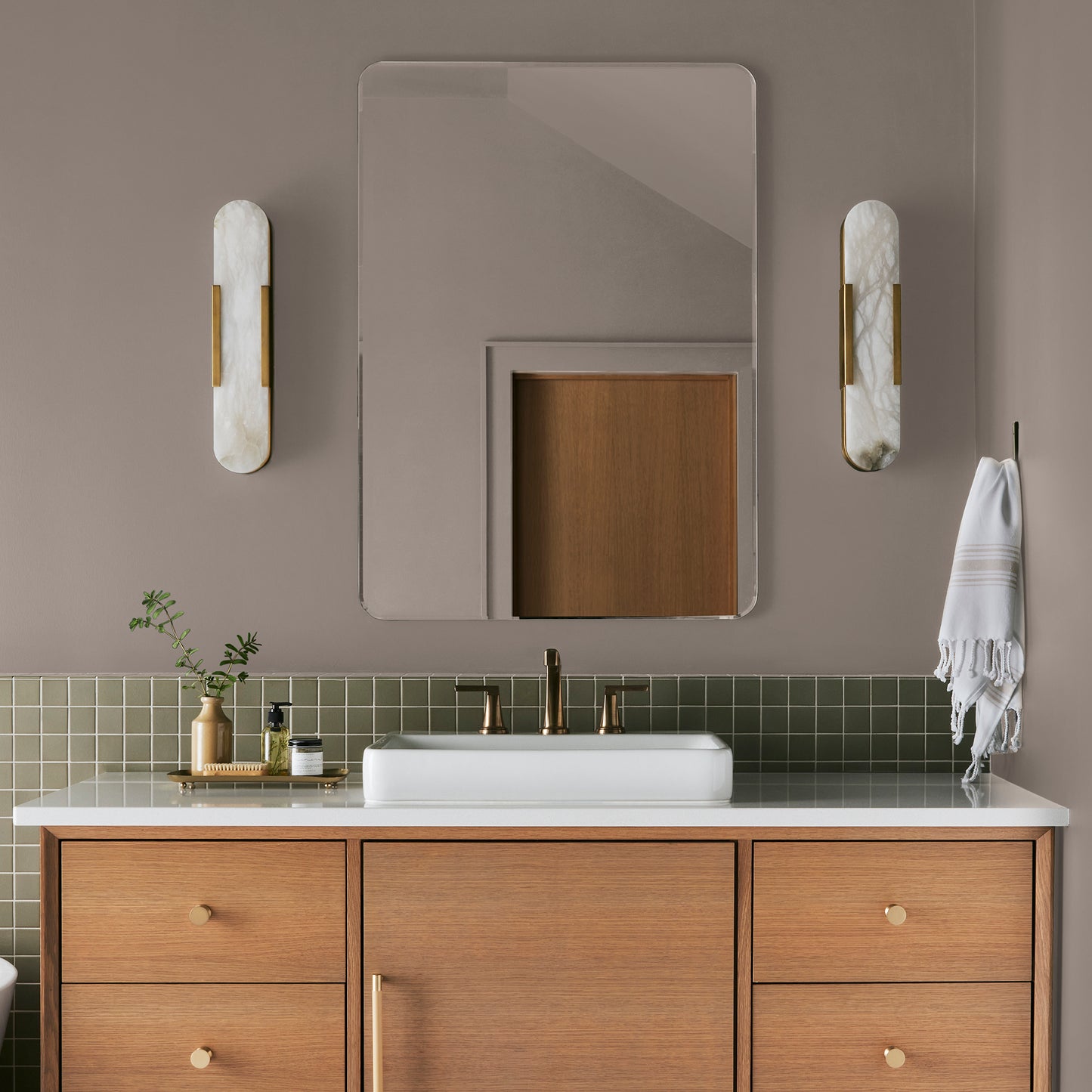 brownish taupe paint named antiquing shown painted on bathroom wall
