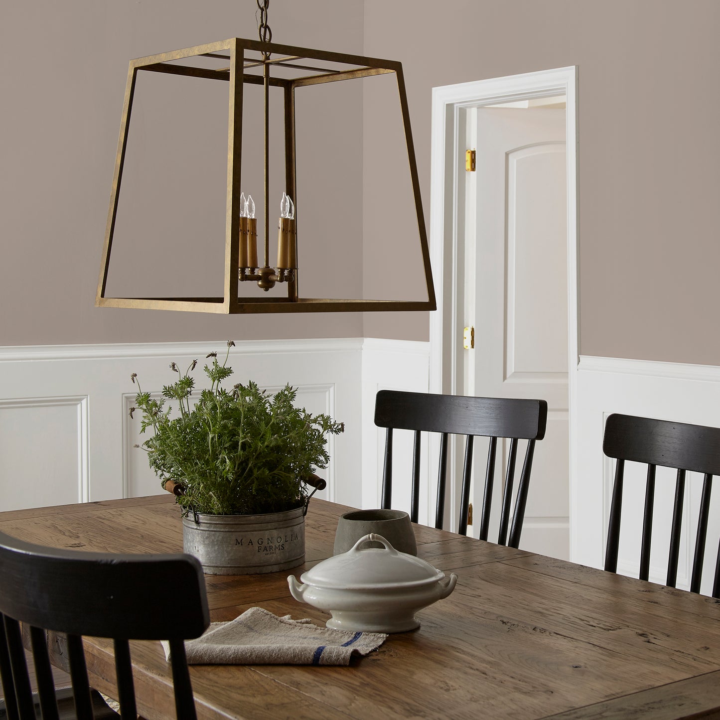 brownish taupe paint named antiquing shown painted on dining room wall