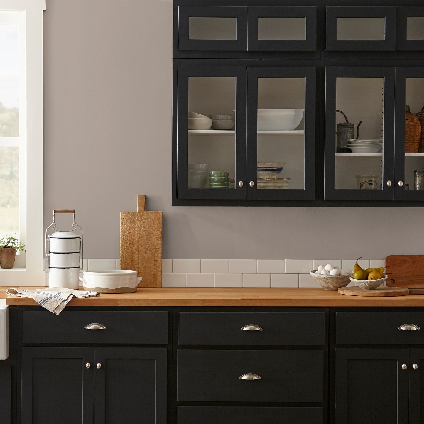 brownish taupe paint named antiquing shown painted on kitchen wall