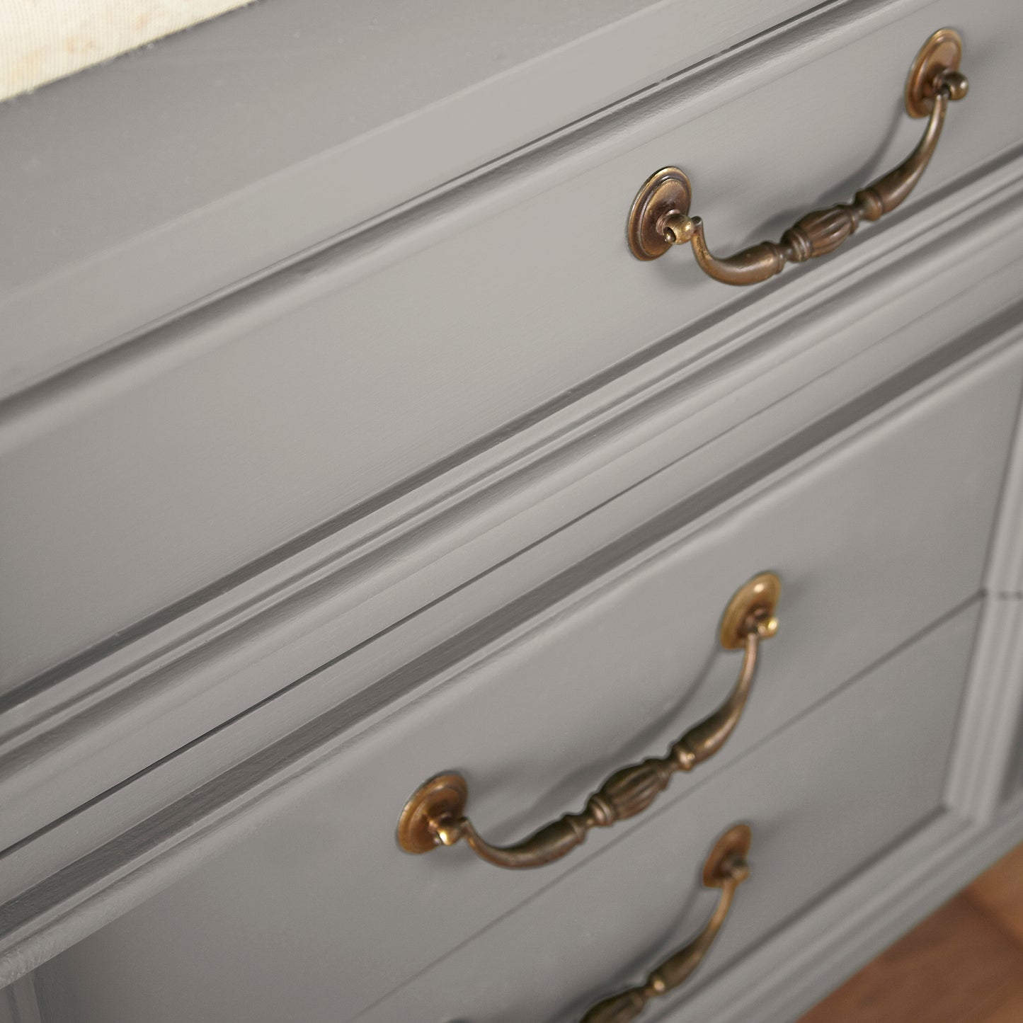 Muted gray with lavender hues door and cabinet paint named watering can shown painted on cabinet