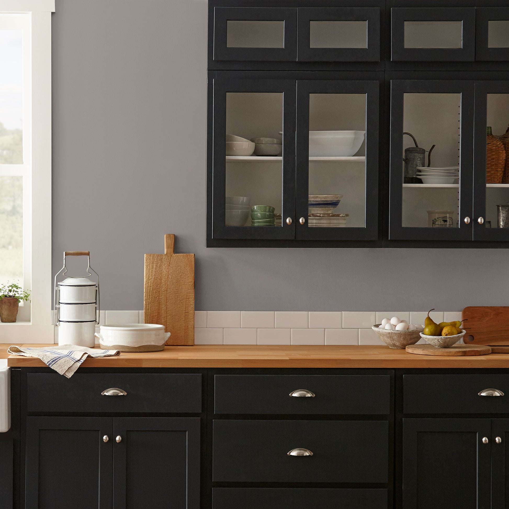 mousy brown interior paint named wooden palette shown painted on kitchen wall