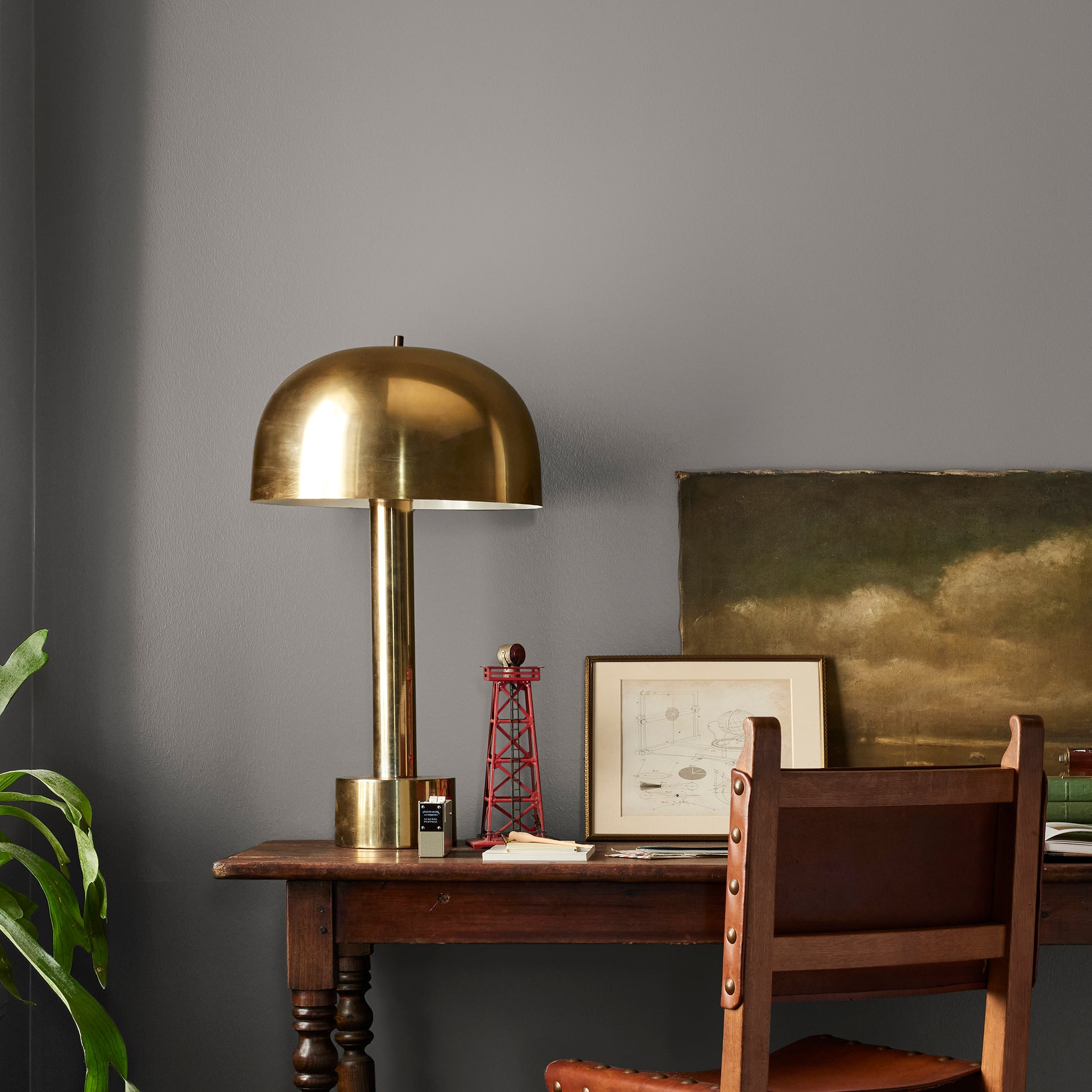 Smoky mid-toned brown interior paint named nesting box shown painted on bedroom wall