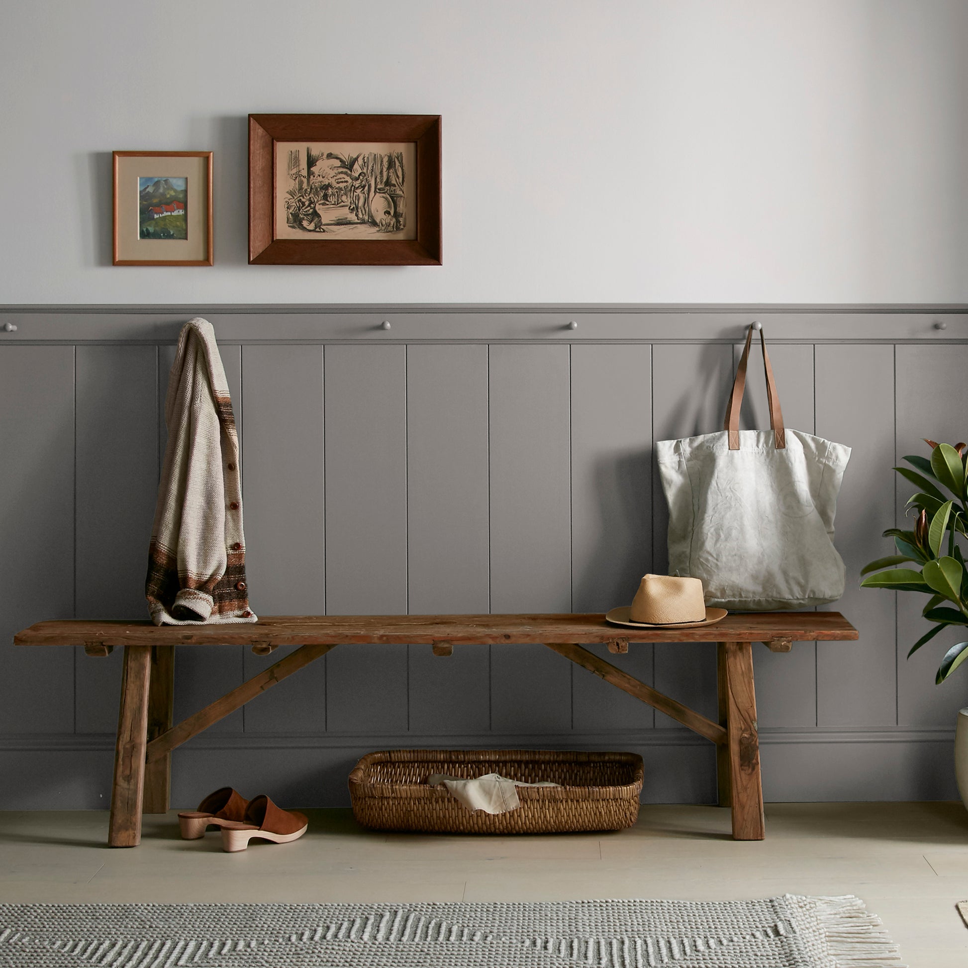 Smoky mid-toned brown interior paint named nesting box shown painted on entryway wall