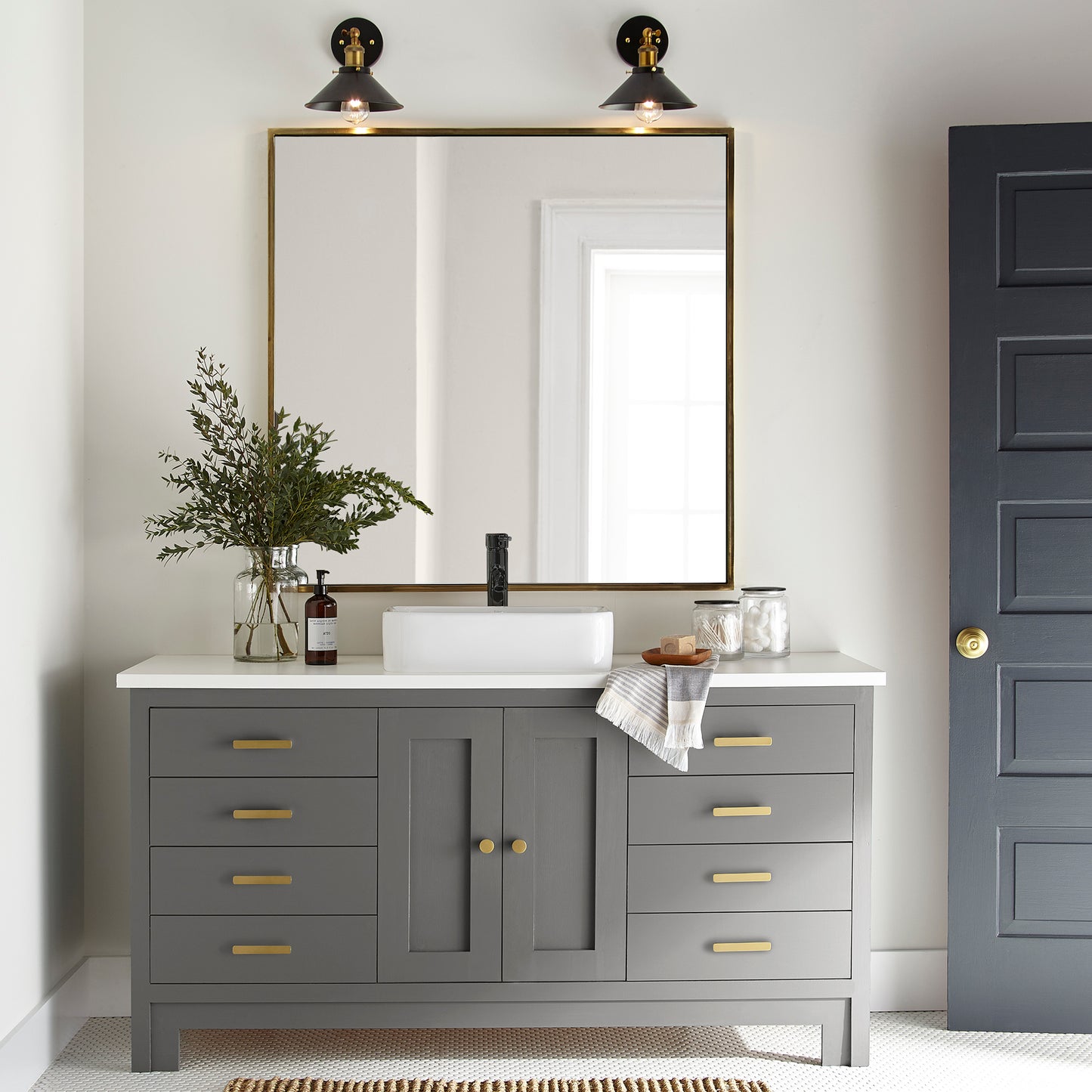 Dark gray touched brown door and cabinet paint named salvaged shown painted on bathroom cabinet