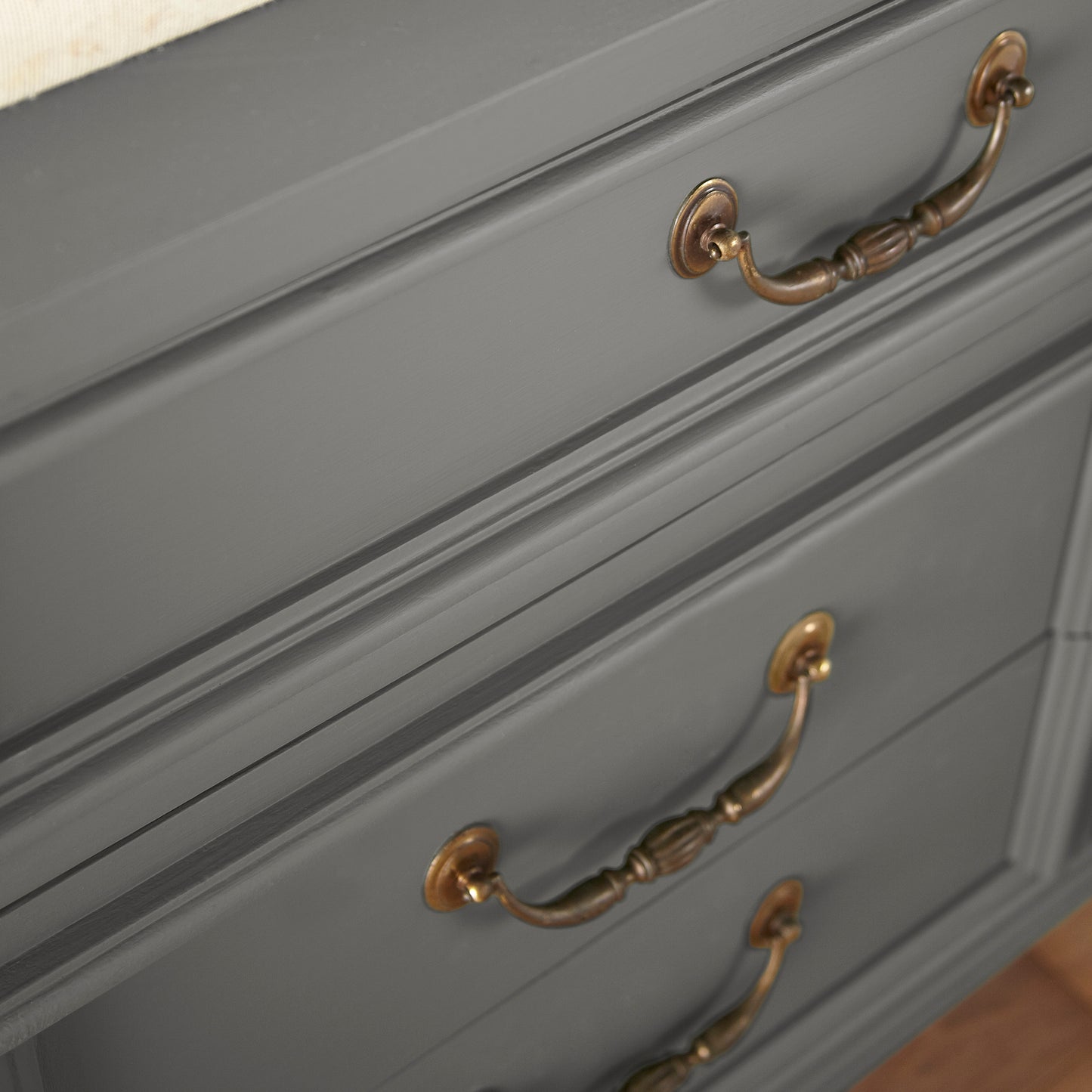 Dark gray touched brown door and cabinet paint named salvaged shown painted on cabinet