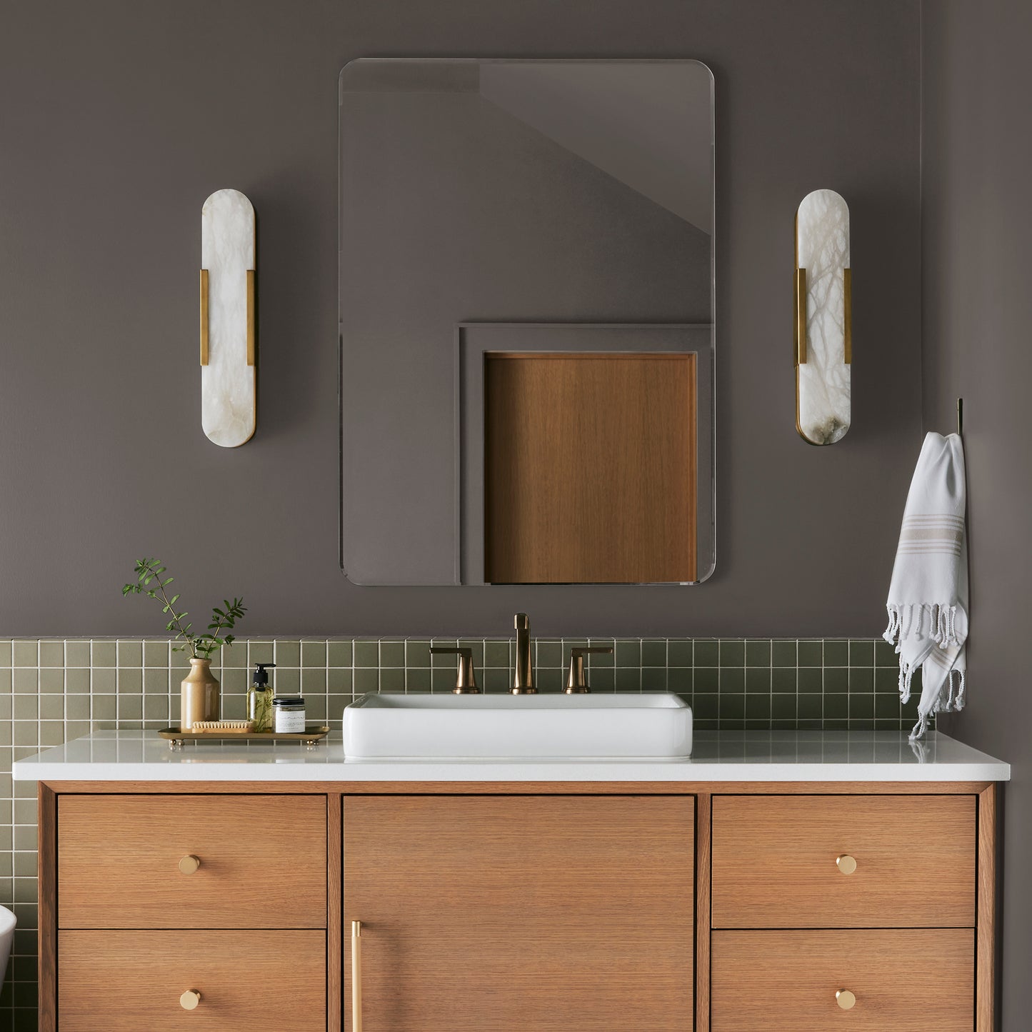 dark cocoa brown paint named cut cedar shown painted on bathroom wall