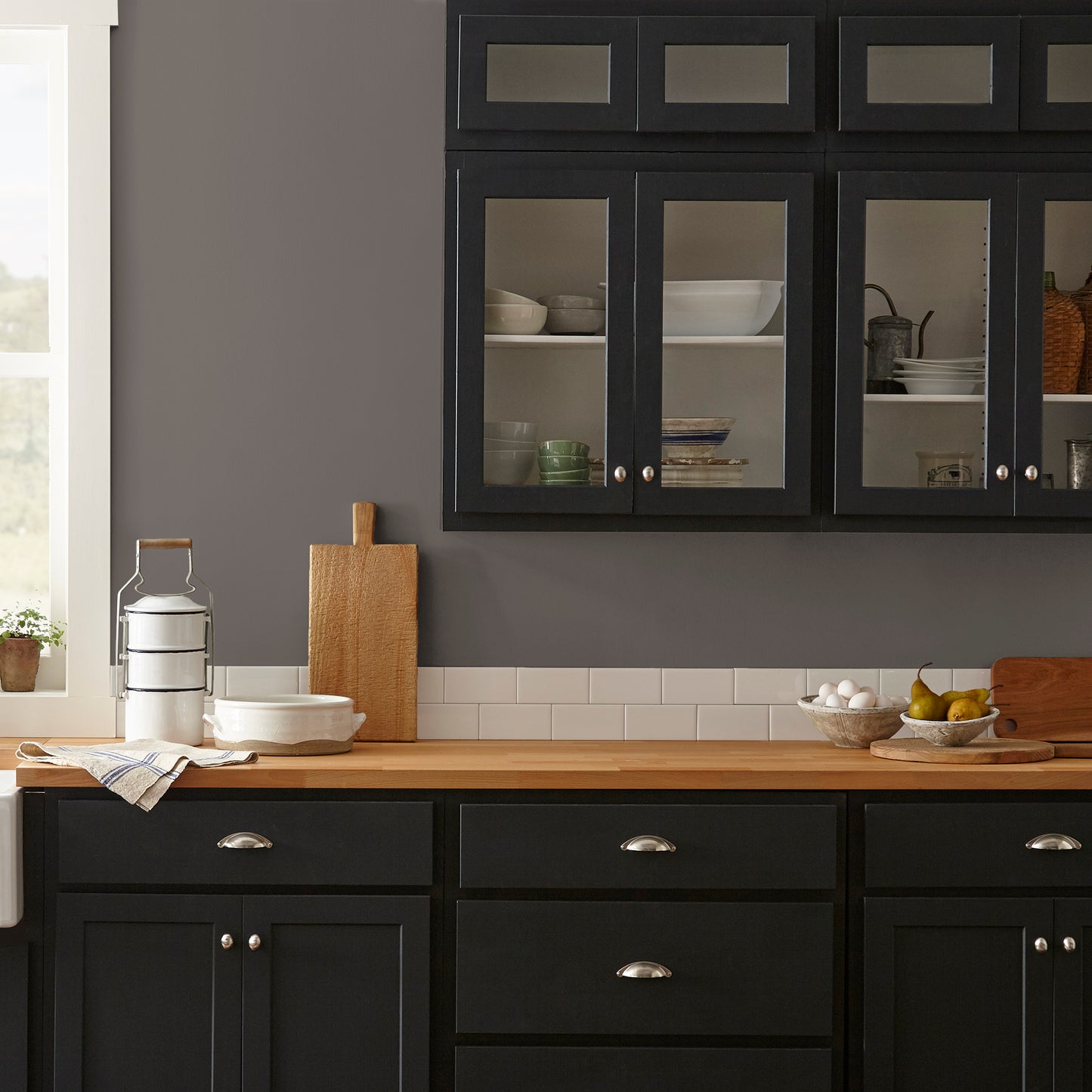 dark cocoa brown paint named cut cedar shown painted on kitchen wall