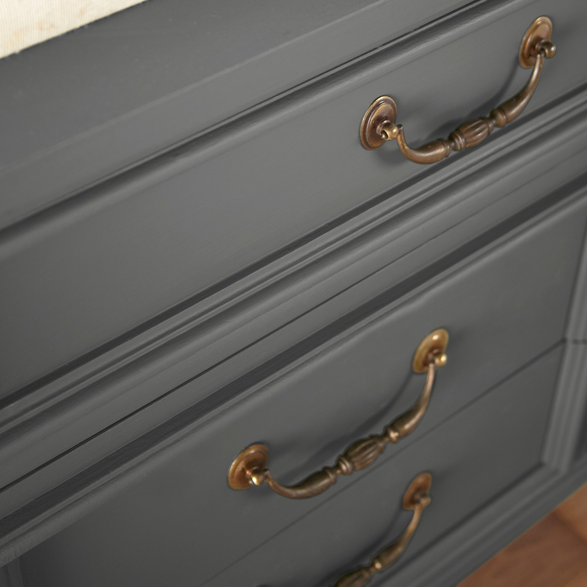 Almost black with green undertones door and cabinet paint named prairie smoke shown painted on cabinet