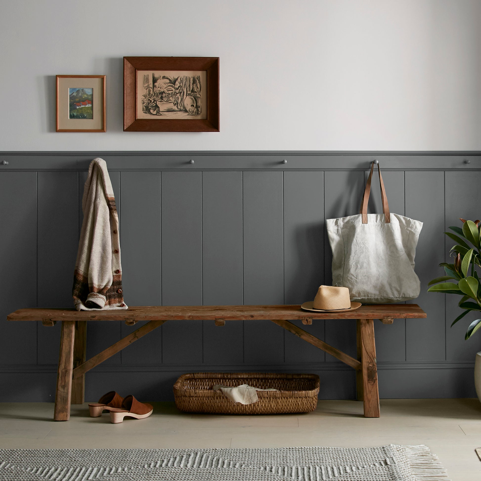 A chalky black interior paint named aspen stone shown painted on entryway wall