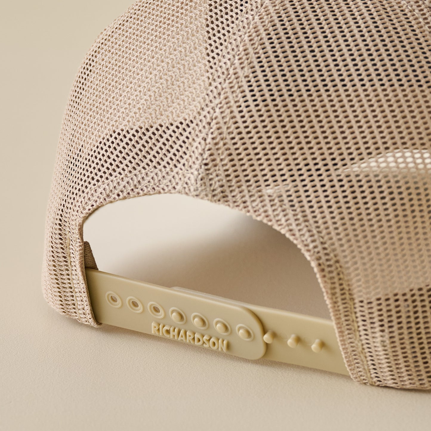 Magnolia Brown and Khaki Leather Patch Hat snap closure up close