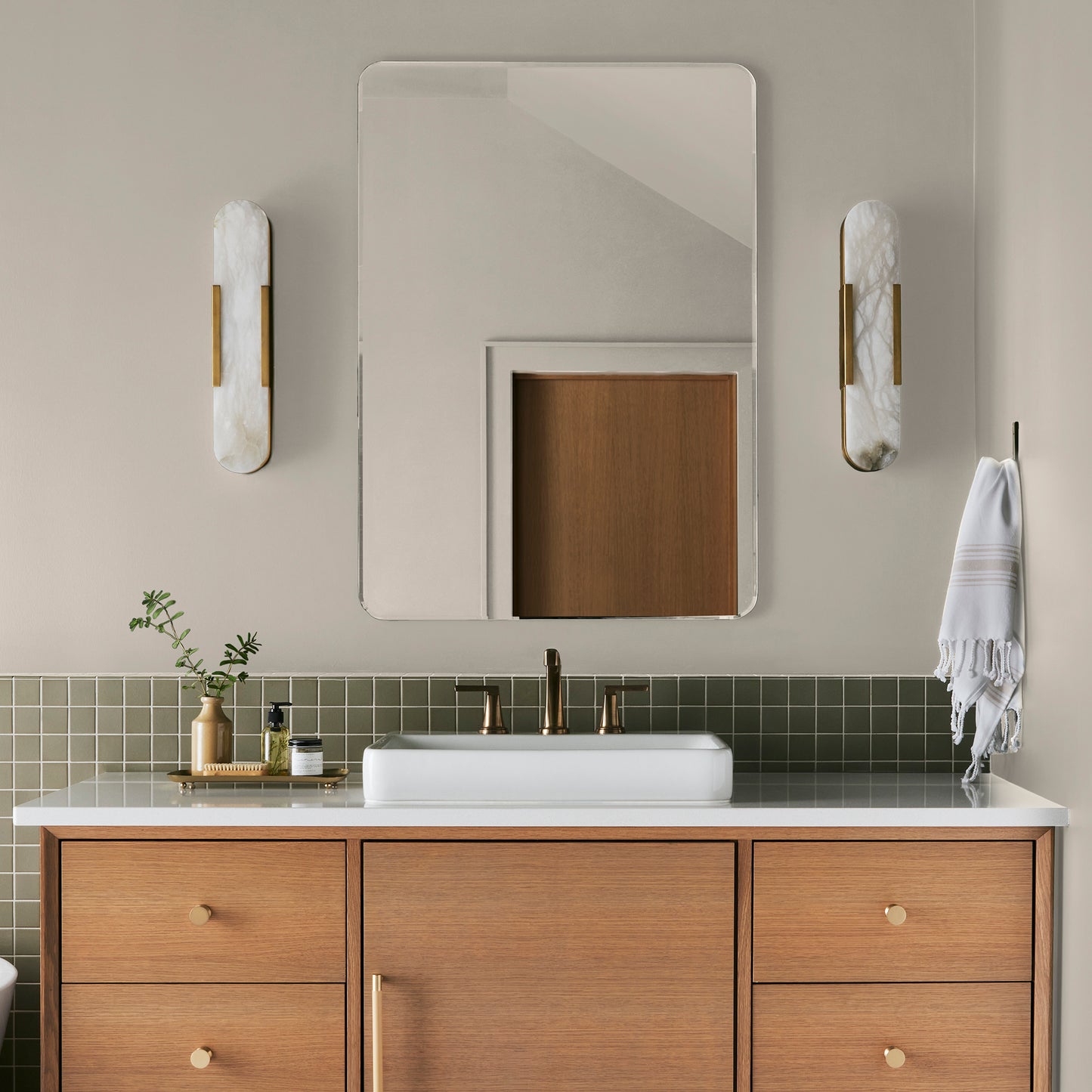Creamy soft white interior paint named castle cream shown painted on bathroom wall