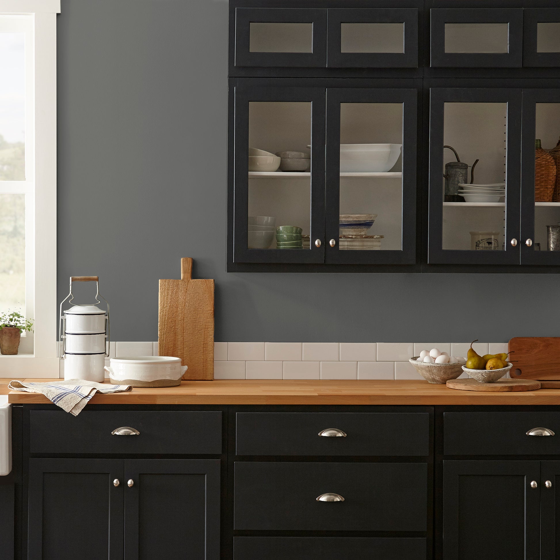 rich charcoal gray interior paint named Conservatory shown on kitchen wall