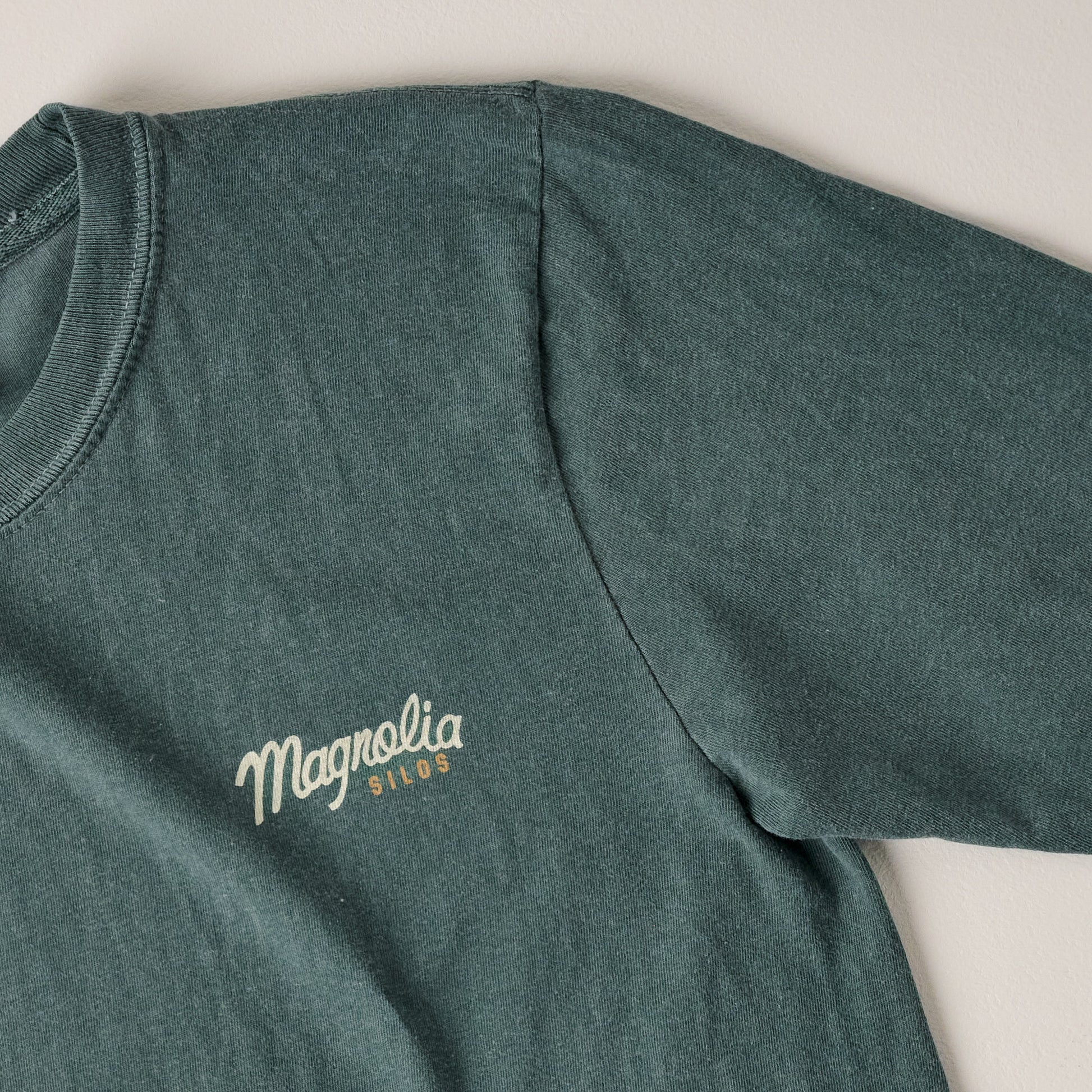 Front of Magnolia Script Silos Blue Spruce Long Sleeve Shirt close up