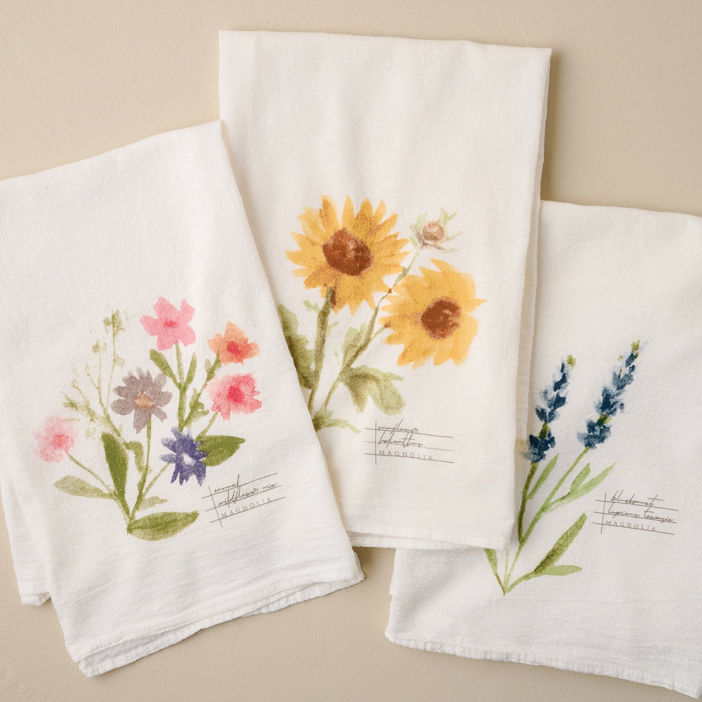 Magnolia Sunflower Tea Towel with others in the set