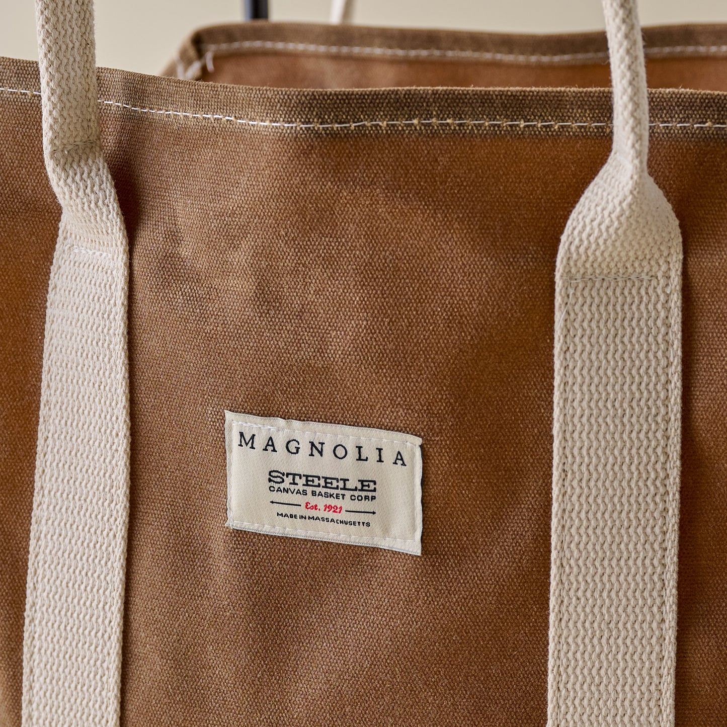 Magnolia Waxed Canvas Log Holder + Frame up close