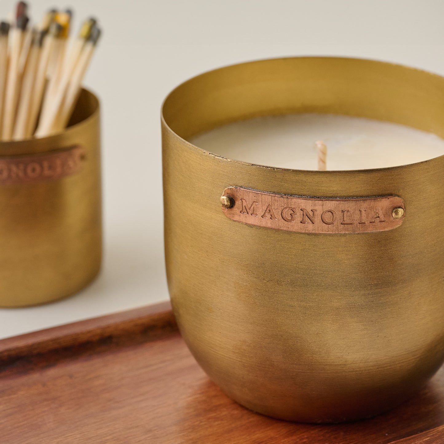Magnolia Santalum Brass and Copper Candle Set up close