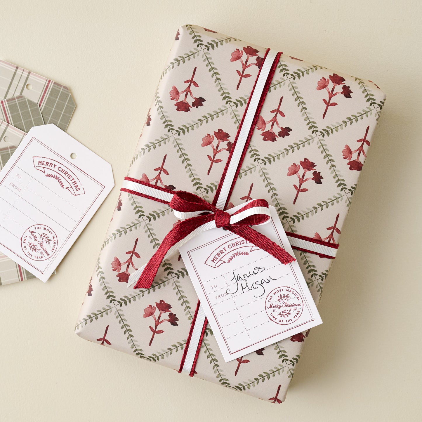 Settle In Block Print Green Plaid Gift Tag Set shown on gift