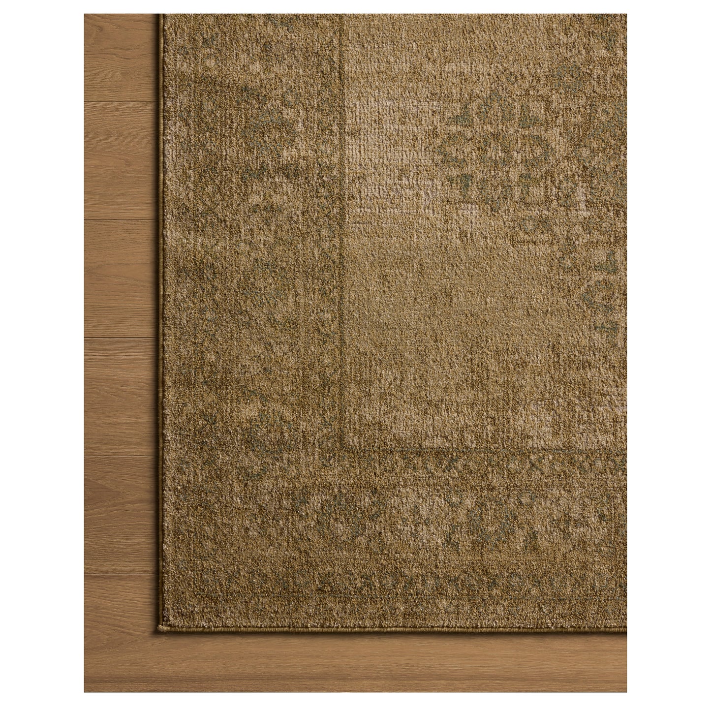 Mona Antique Spa Rug close up of corner on wood floor