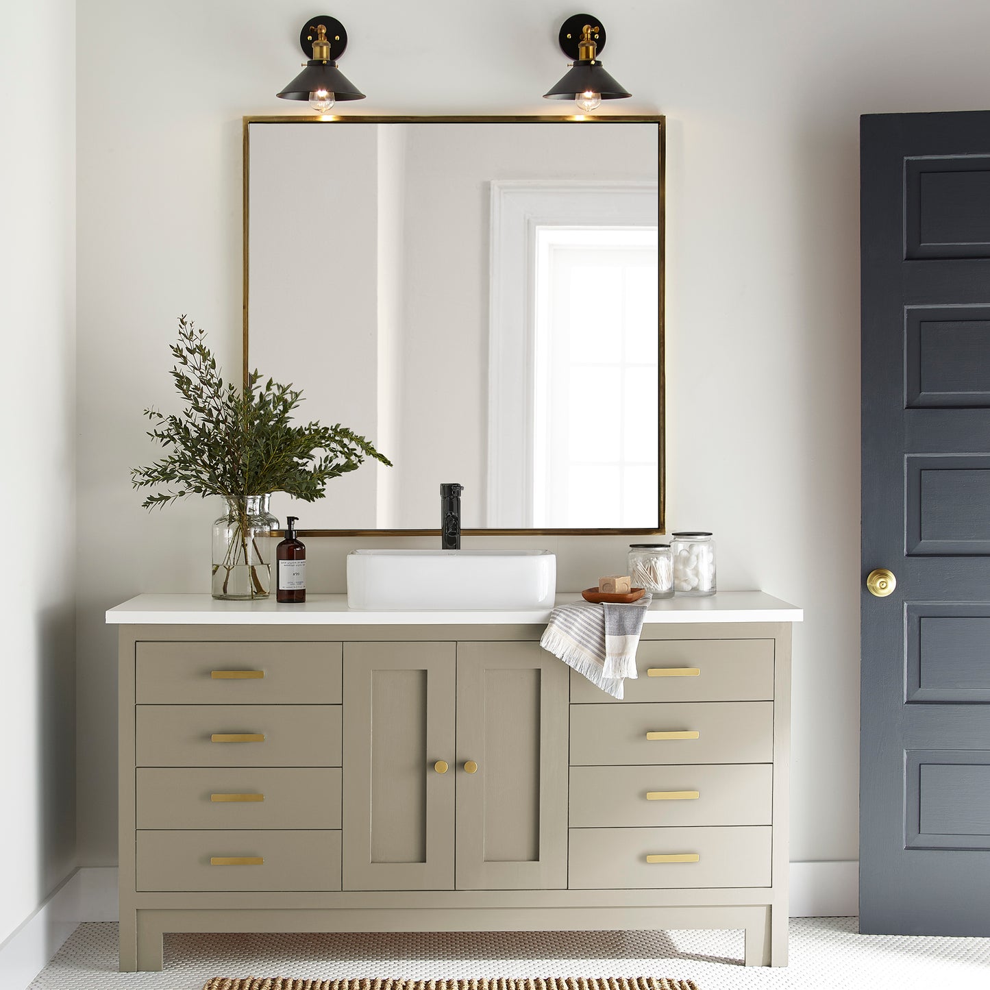 sunwashed green paint color named juniper tree shown painted on bathroom cabinet