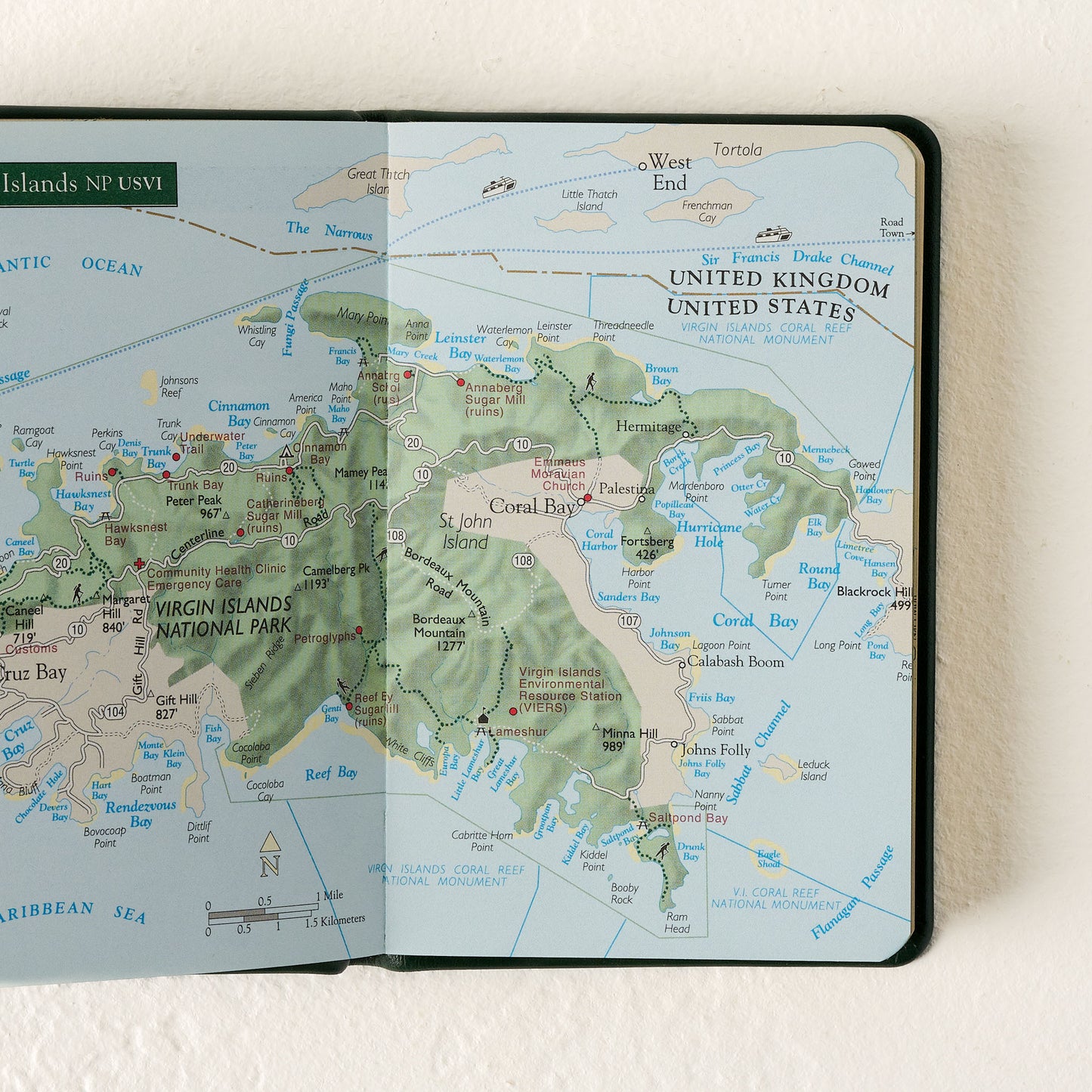 Green National Parks Guide open to a page showing a map