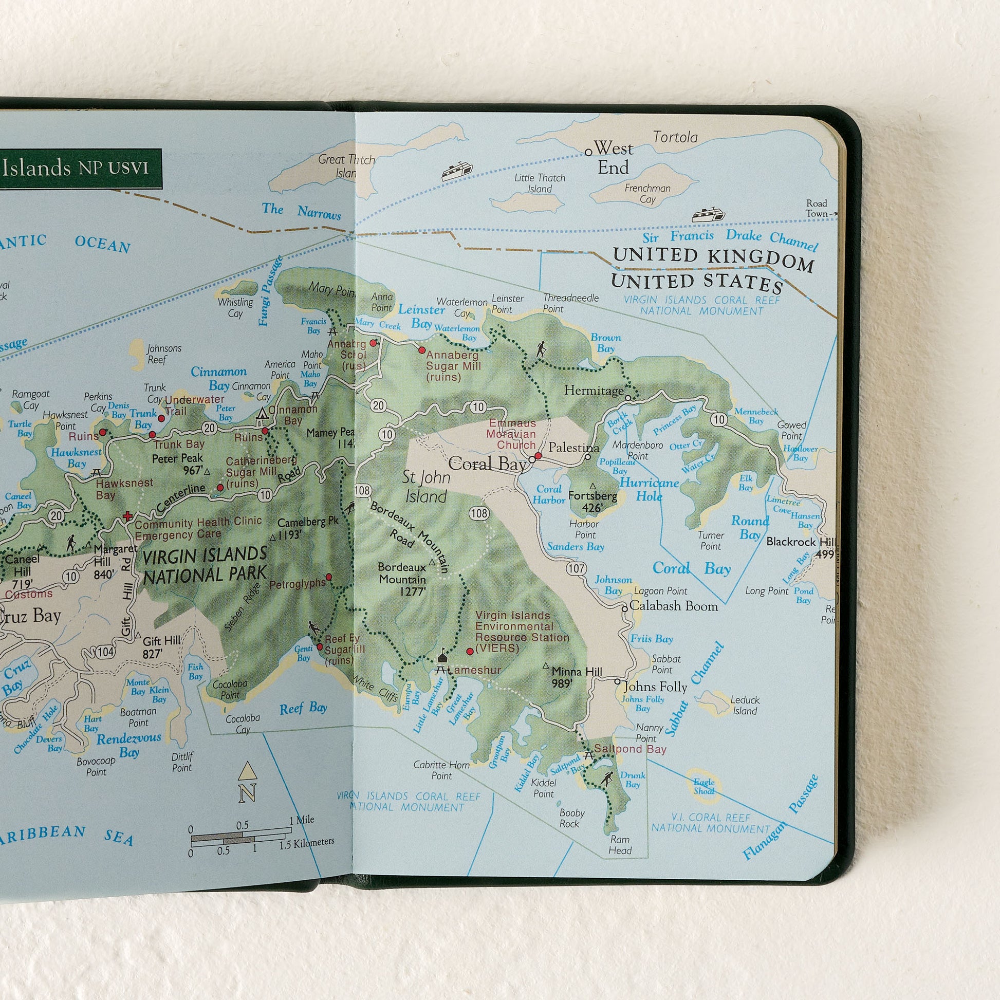 Green National Parks Guide open to a page showing a map