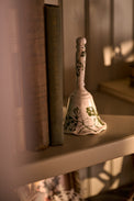 Heirloom Garden Ceramic Bell on a shelf