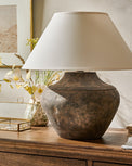Valencia Table Lamp on a dresser next to a vase with florals