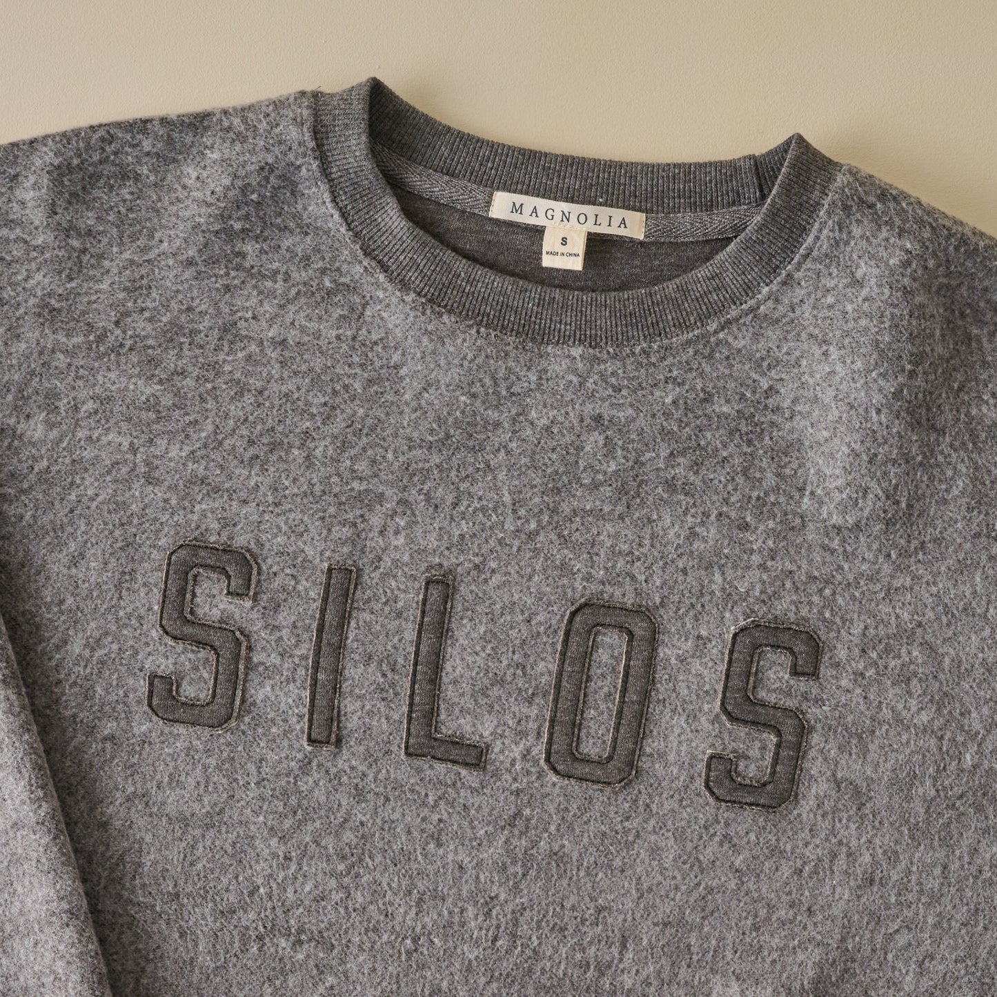 Silos Applique Charcoal Cozy Fleece up close