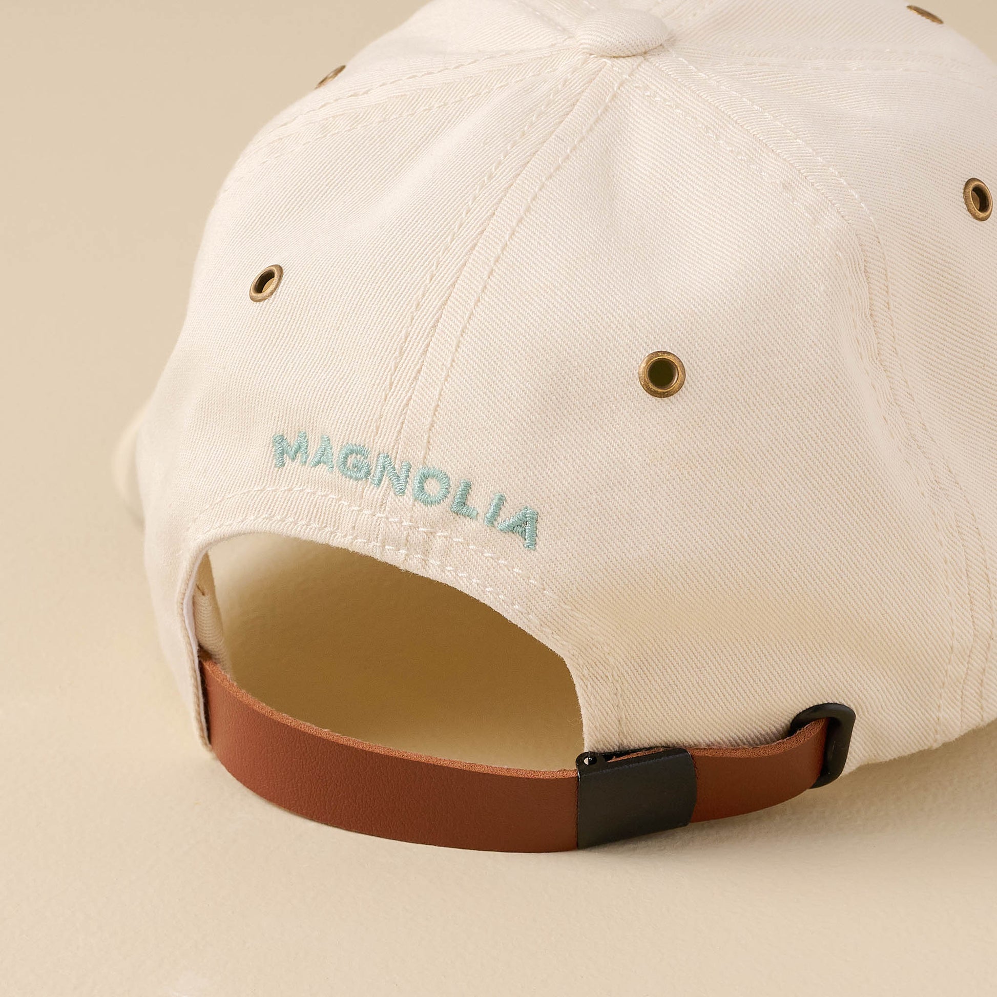 Silos Distressed Cream Baseball Hat back of hat showing leather adjustable strap