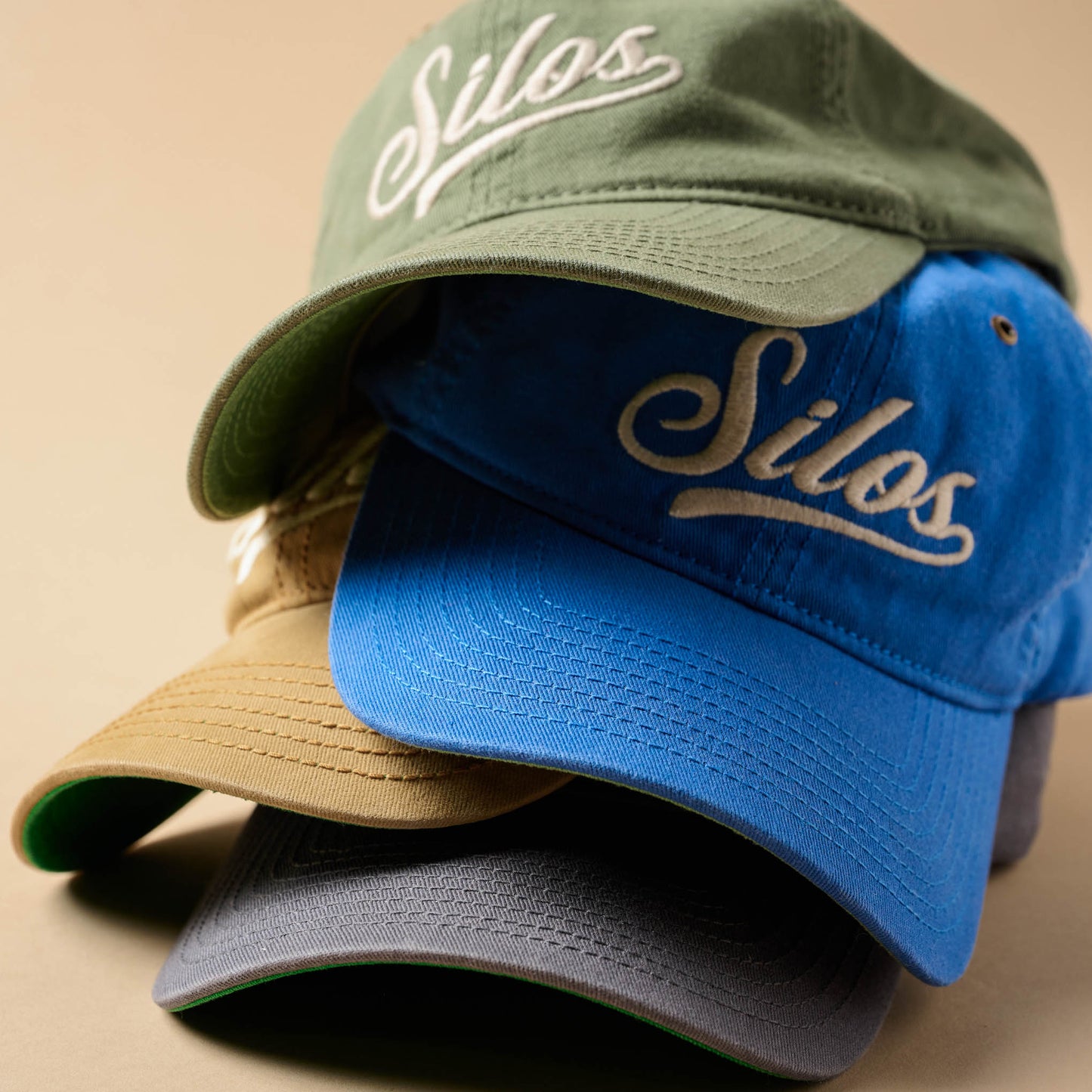 silos hats in various colors stacked on top of each other