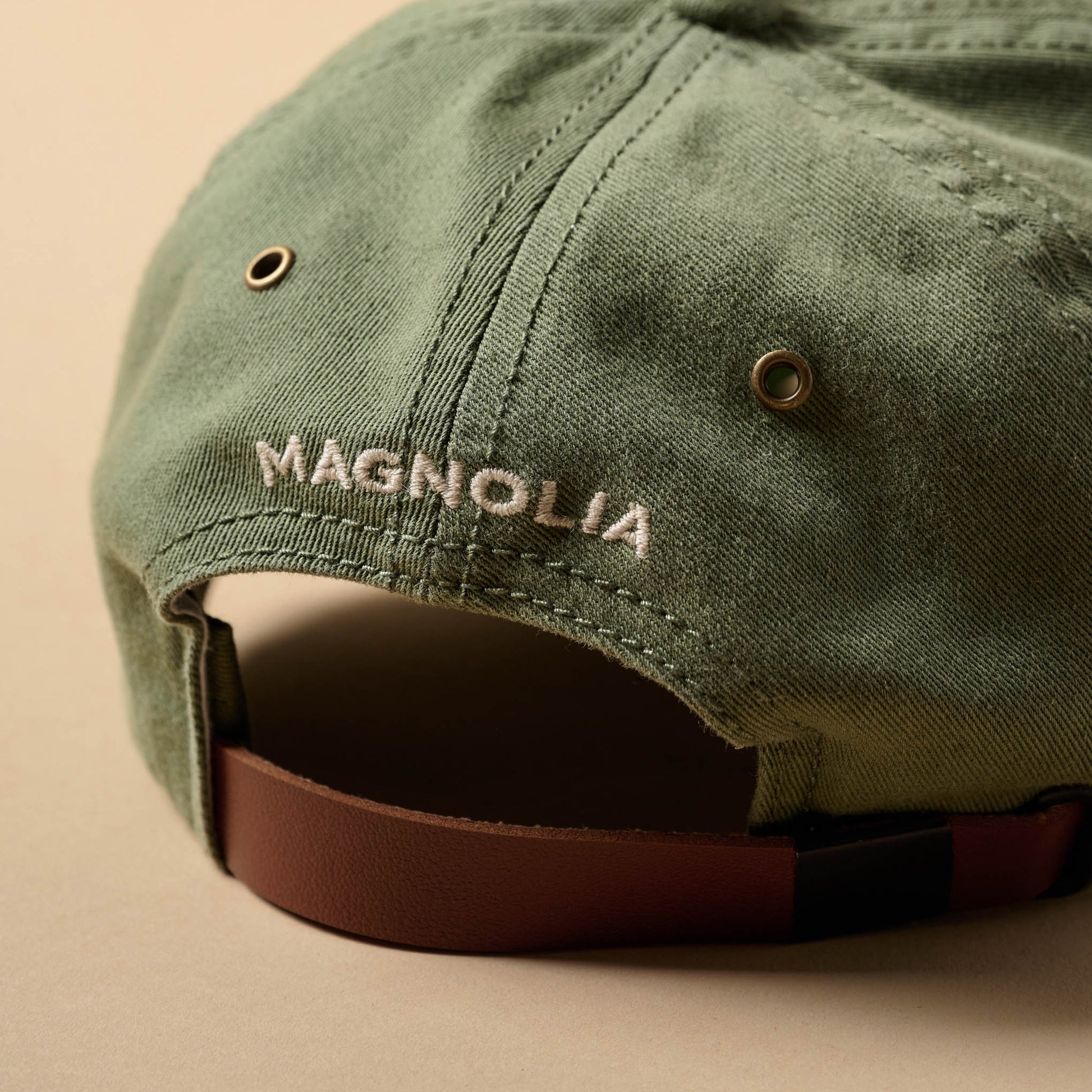 Silos Distressed Olive Baseball Hat magnolia on back of hat