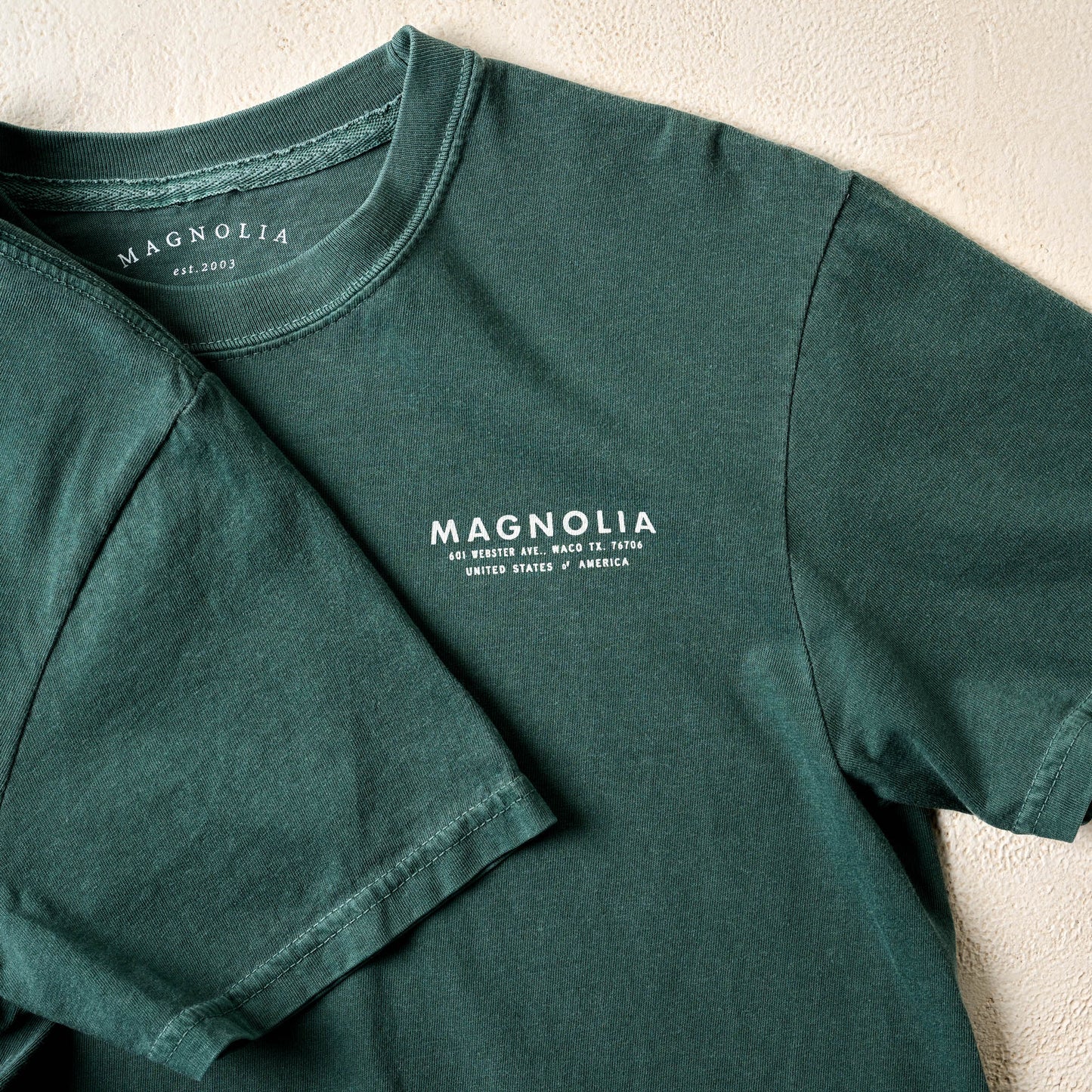 Magnolia Silos Icons Blue Spruce Shirt close up of design on front chest