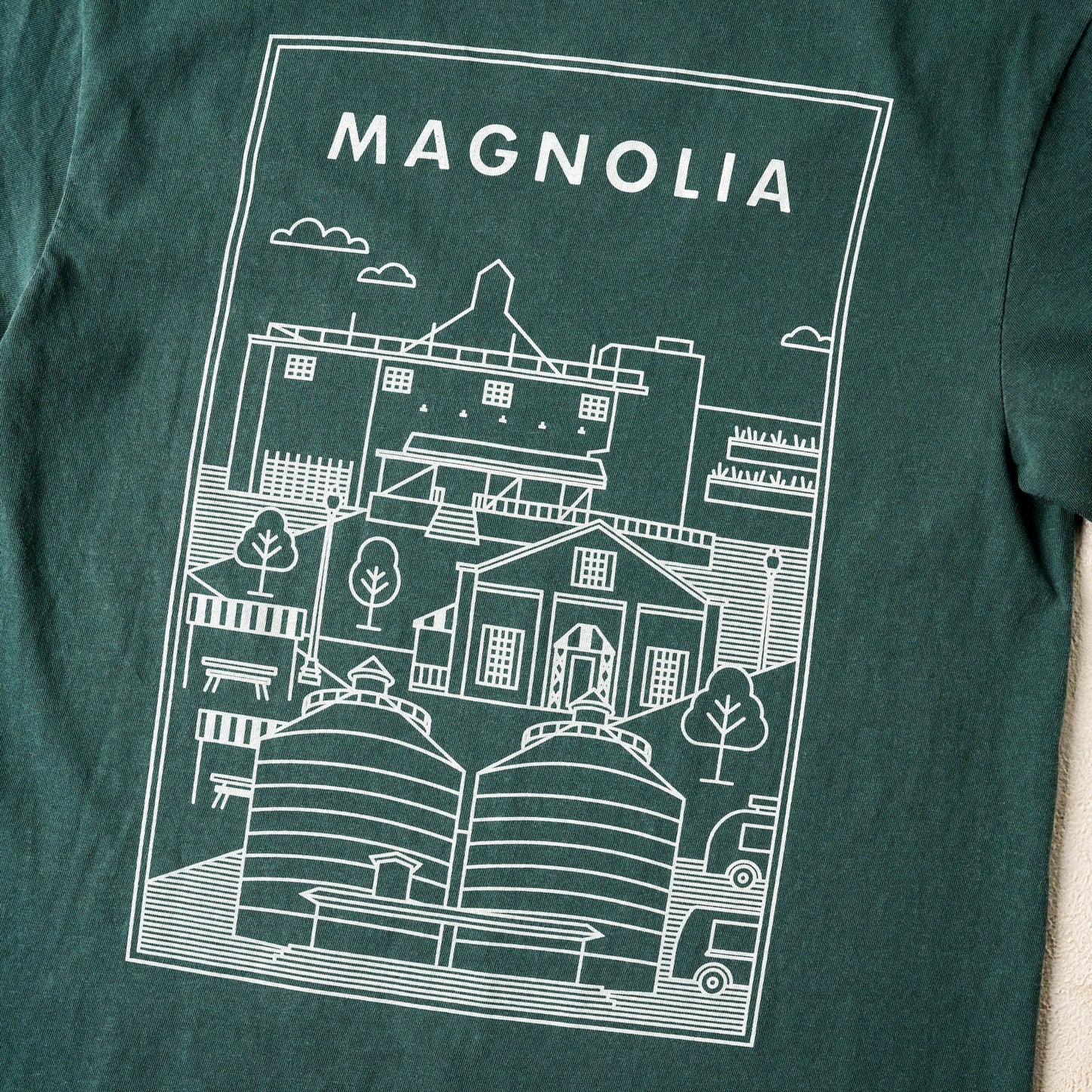 Magnolia Silos Icons Blue Spruce Shirt close up of logo on back of shirt