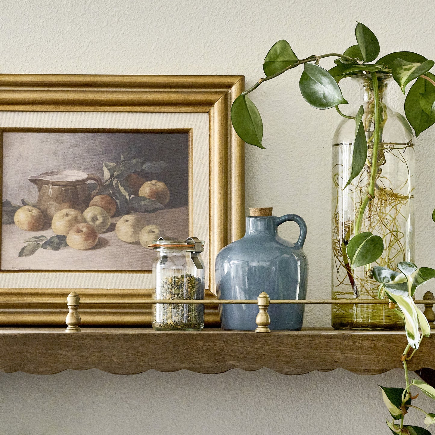 blue ceramic oil dispenser on kitchen shelf