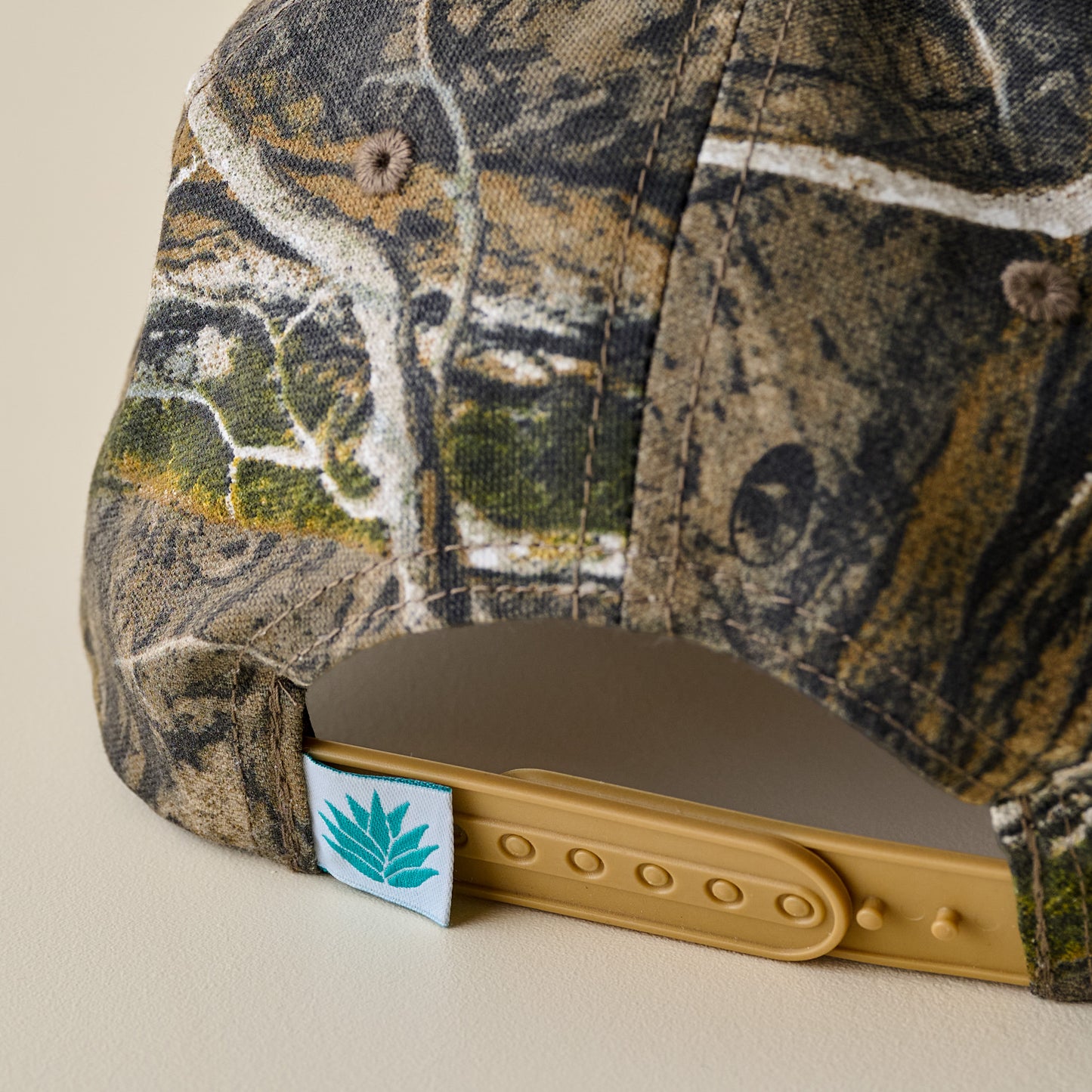 All Hat No Cattle Mossy Oak Camo Hat snap closure up close