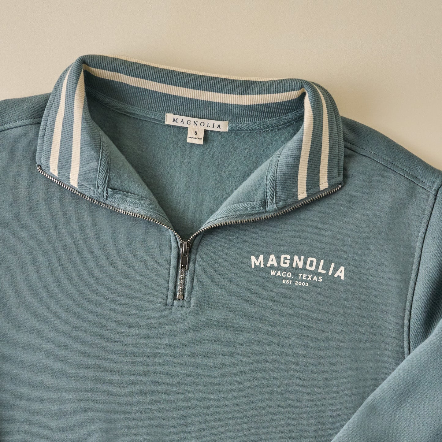 Magnolia Silos Storm Grey Quarter Zip up close