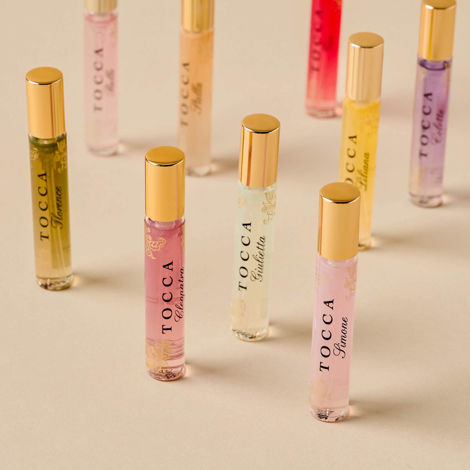 Tocca Luxury Fragrance Wardrobe Tin - fragrances stand against a beige background