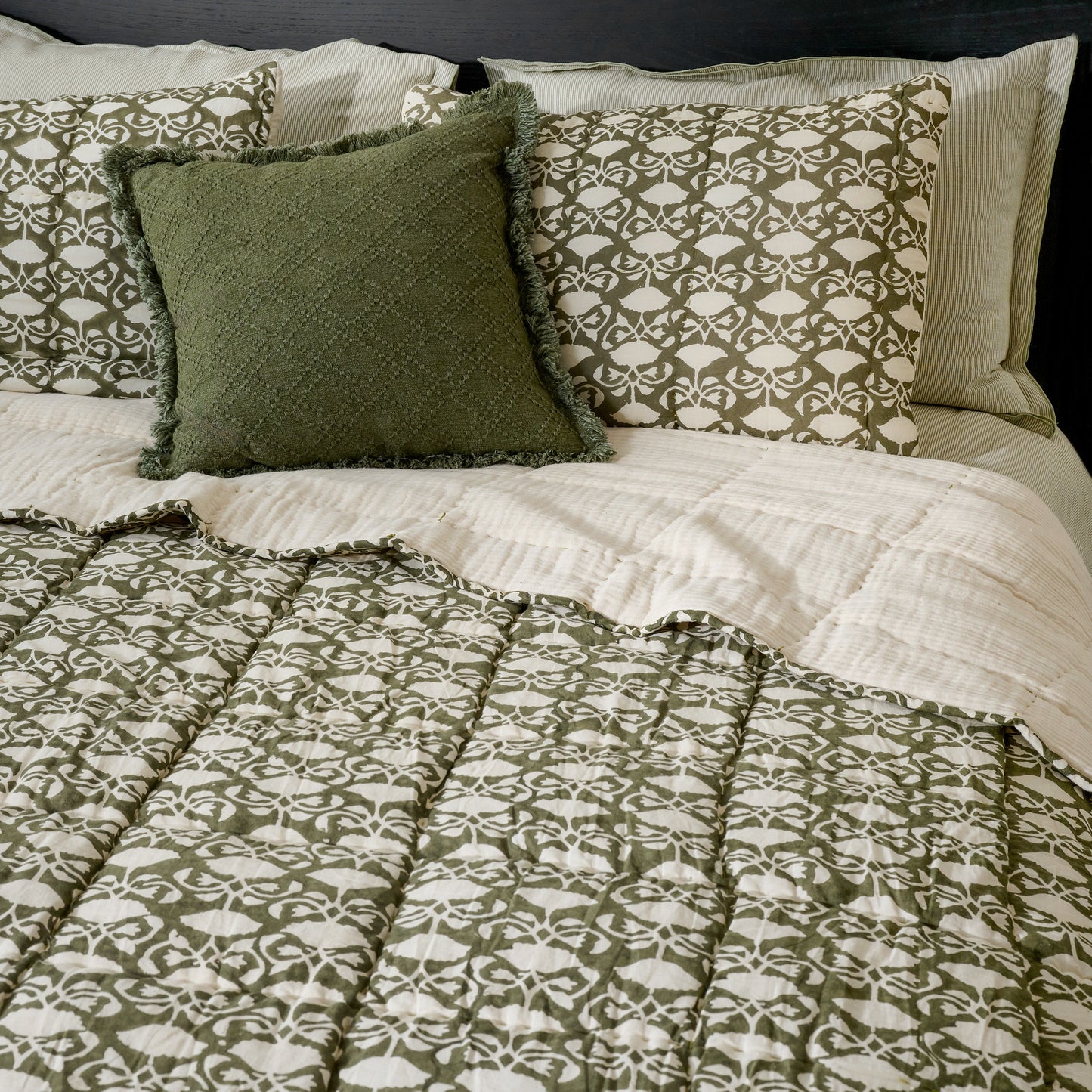 Tuscany Green Pivoine Fleurs Sham shown on bed