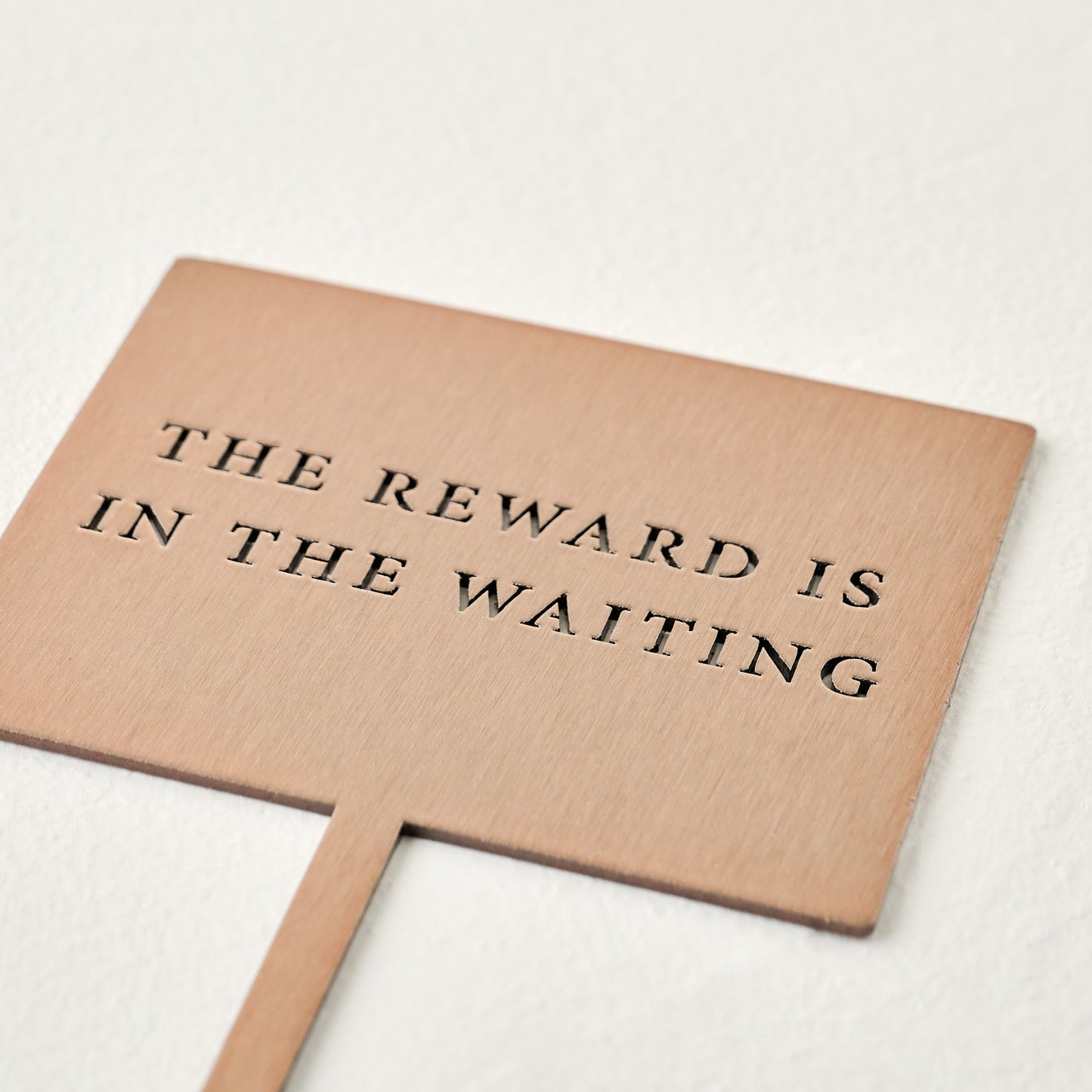 The Reward Mini Garden Stake shown laying down