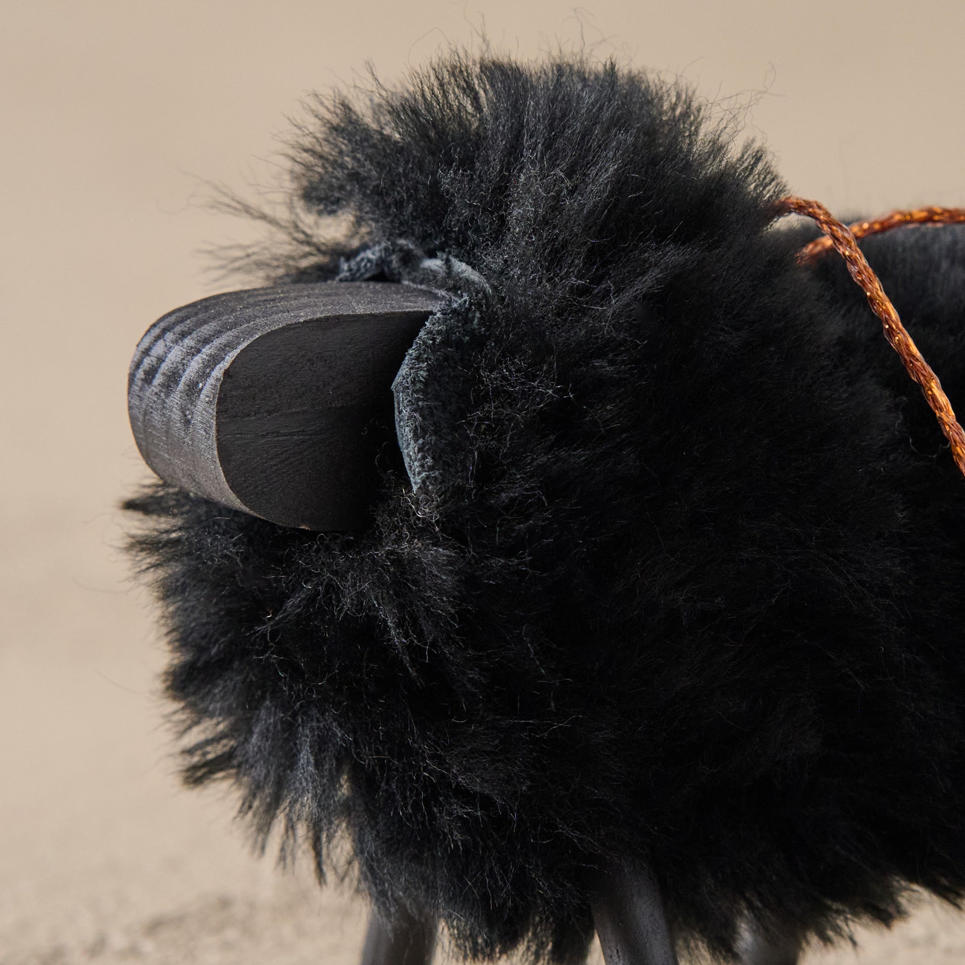 Black Handcrafted Shearling Sheep Ornament up close
