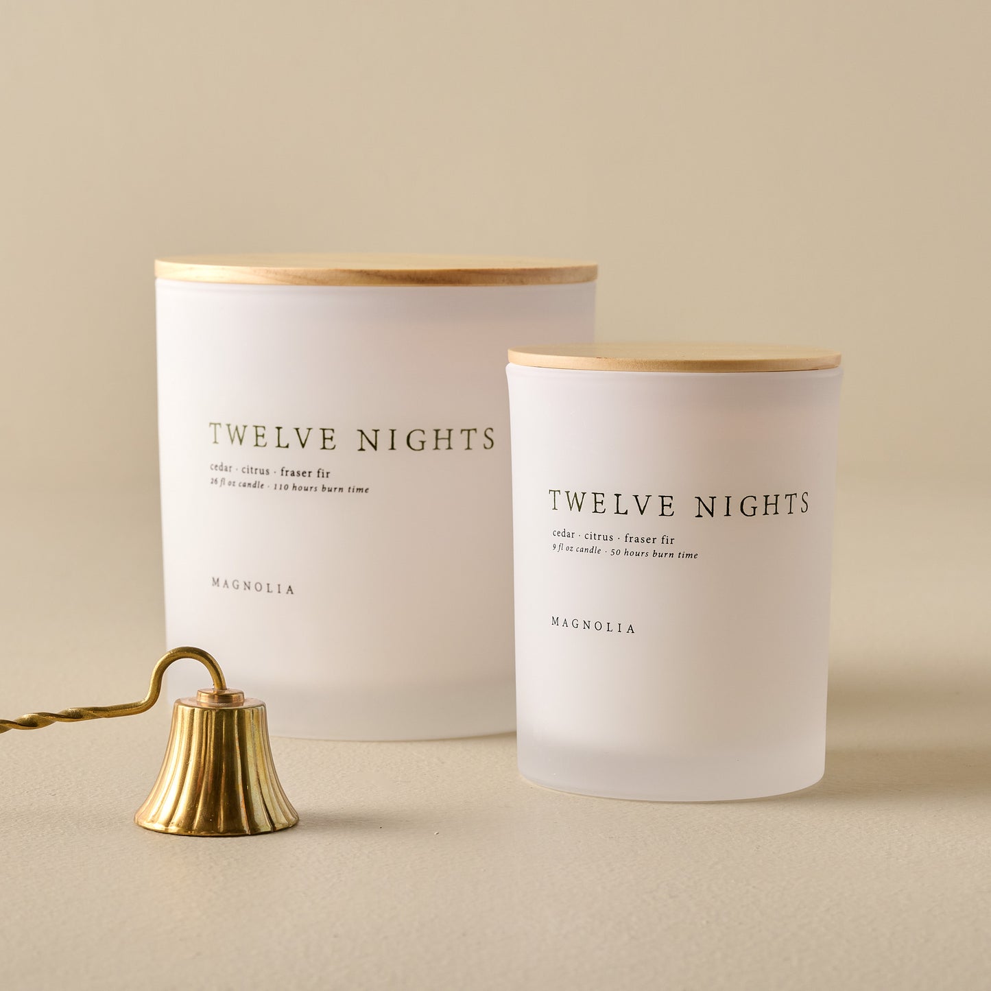 Magnolia Twelve Nights Candles shown with candle snuffer