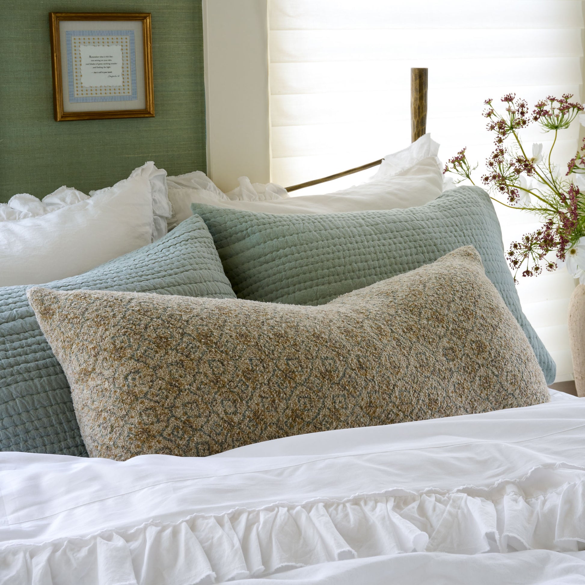 Vintage Floral Large Lumbar Pillow on a made bed